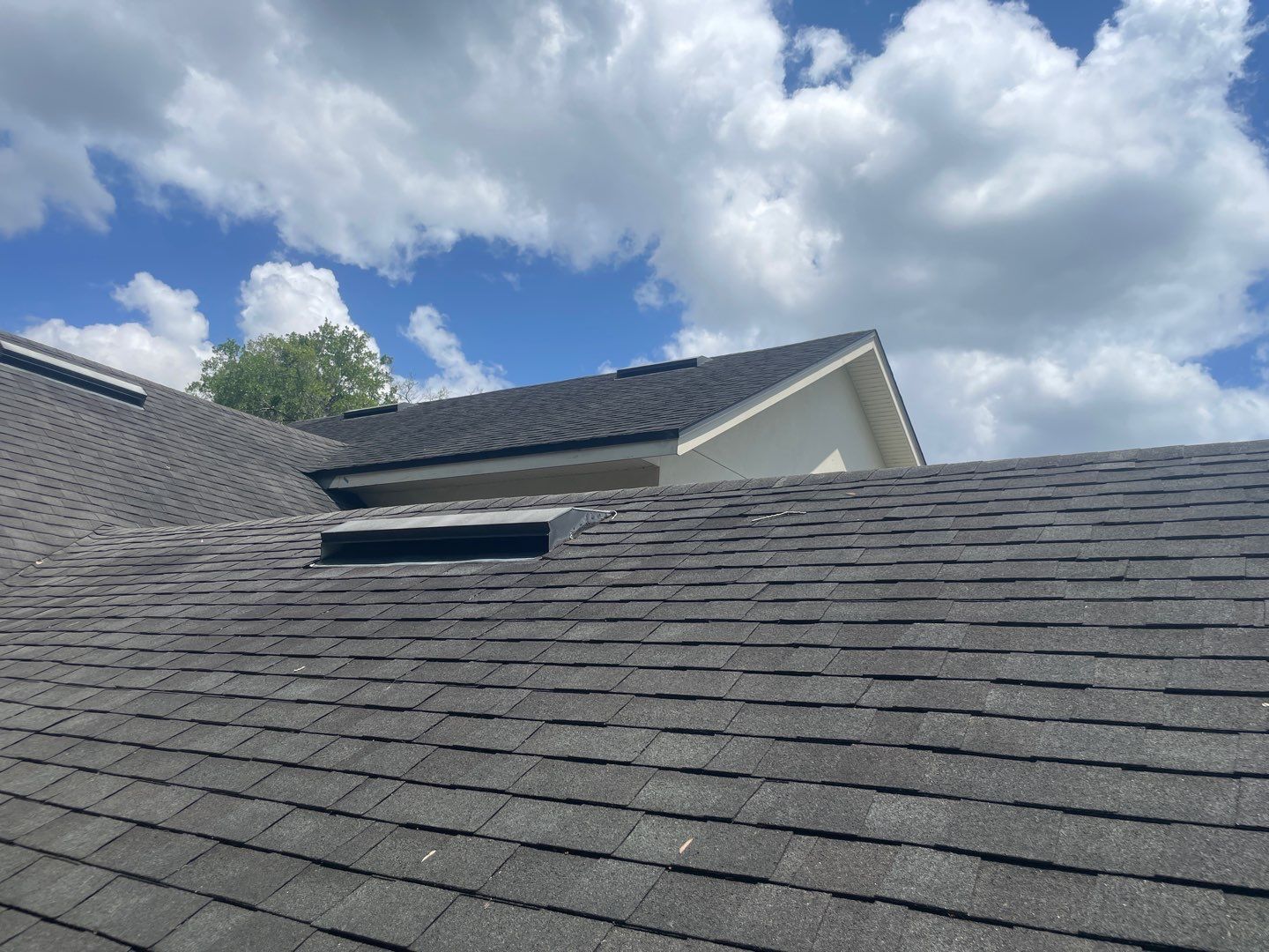 Architectural Shingle Re-Roof for Two-Story Winter Park Home by Tip Top Roofing Co., Inc.