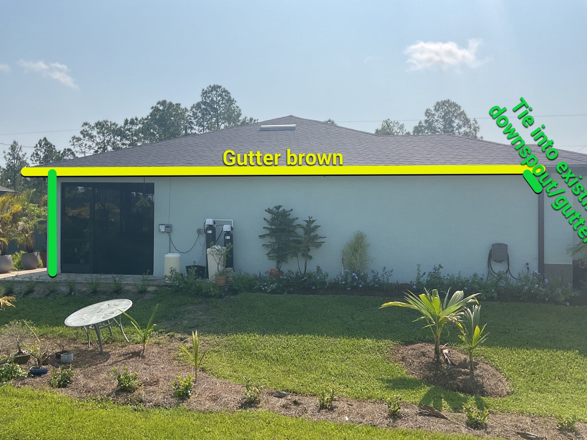 Musket Brown and New Downspouts in Lehigh Acres, FL  by Gutter Professors