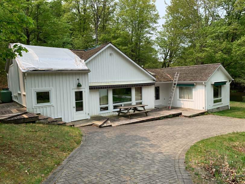 Residential Roofing Installation using 24 Ga Standing Seam Meta by Jay Carter Roofing & Sheet Metal