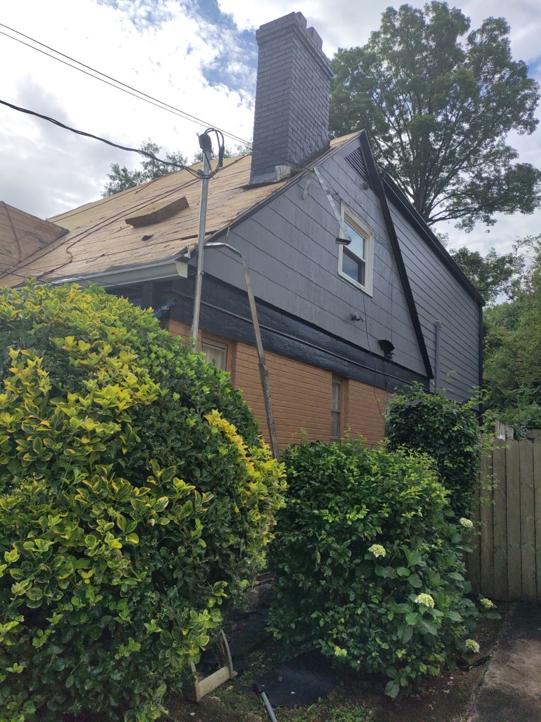 Residential Roof Replacement using Owens Corning Trudef Twilight Black by Inspector Roofing and Restoration