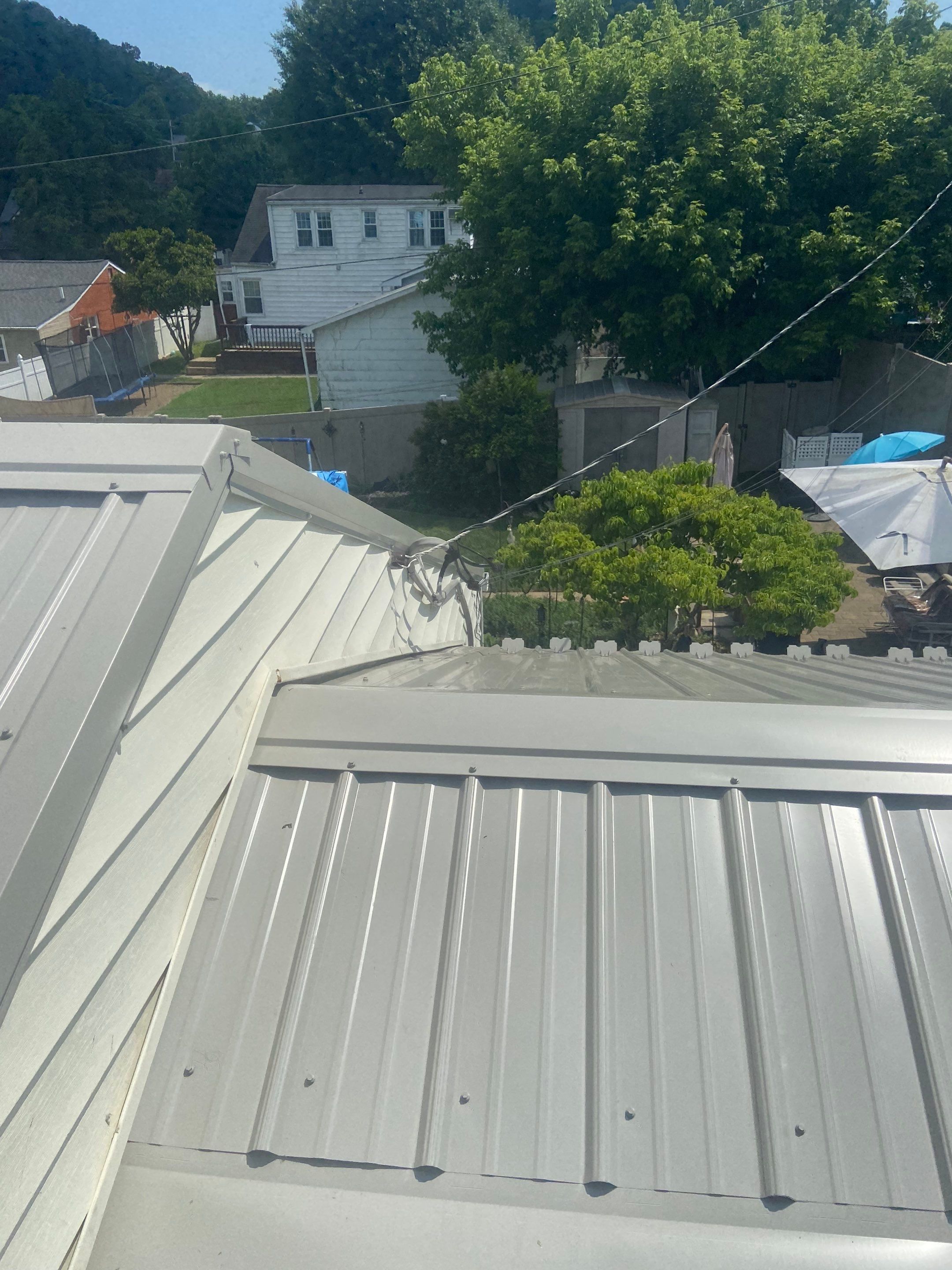 Metal Roofing, Skylights, Porch Build by Secure Construction Company Inc