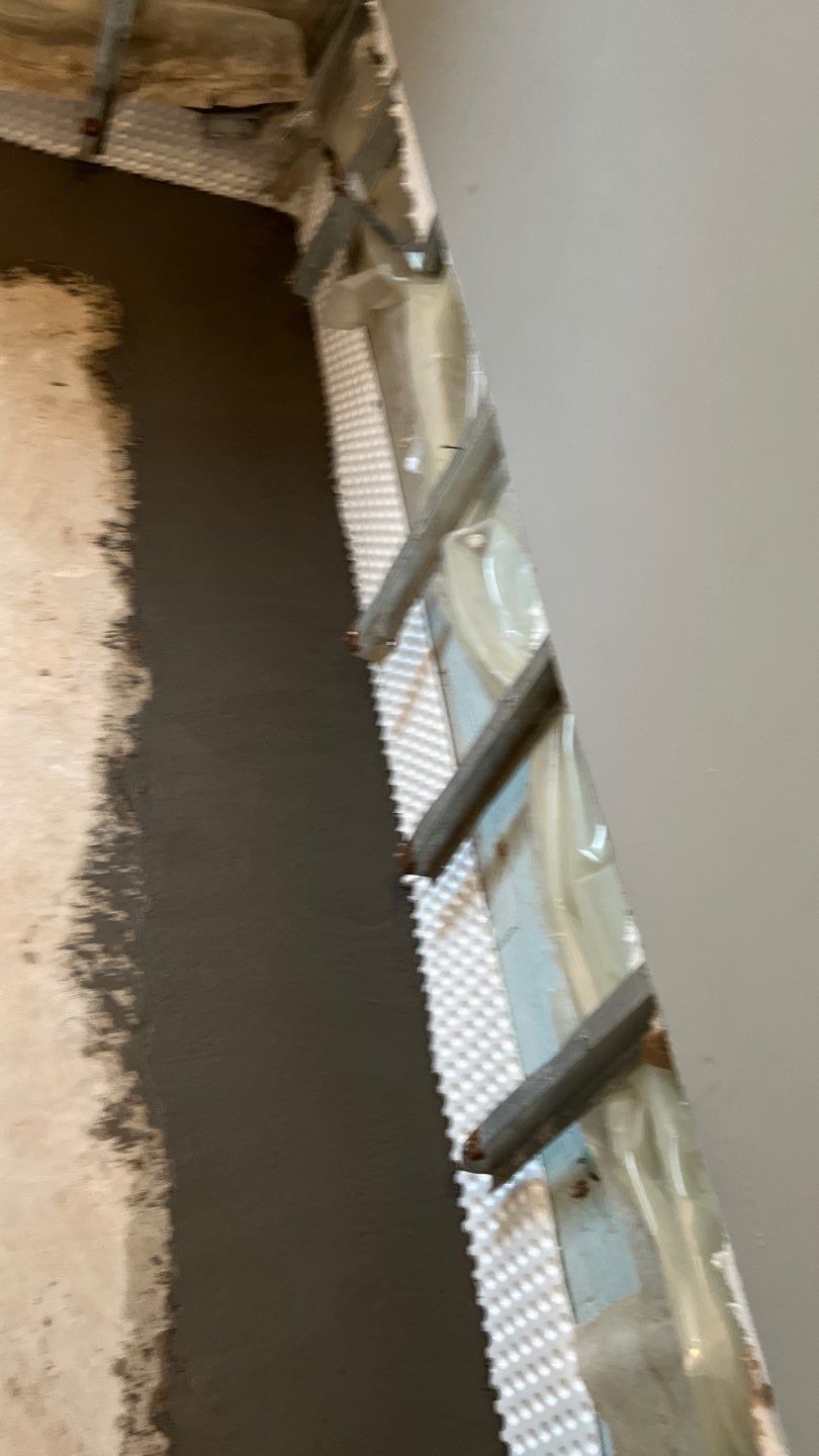 Interior drain tile system installation by ACE Waterproofing & Basement Solutions