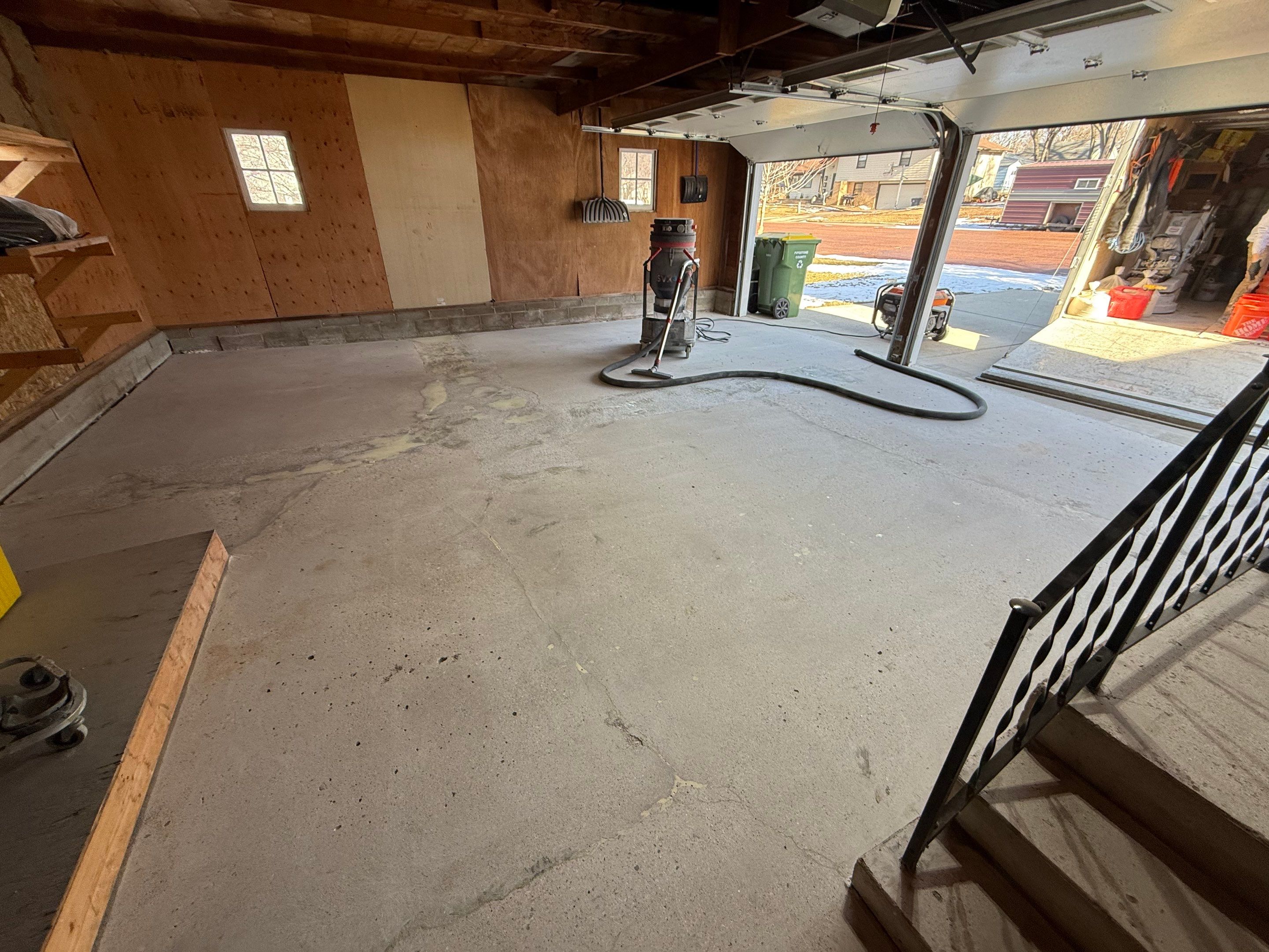 Multi-Colored Epoxy Garage Floor Coating and Concrete Stair Restoration by Select Painting, Coatings & Garage Cabinets