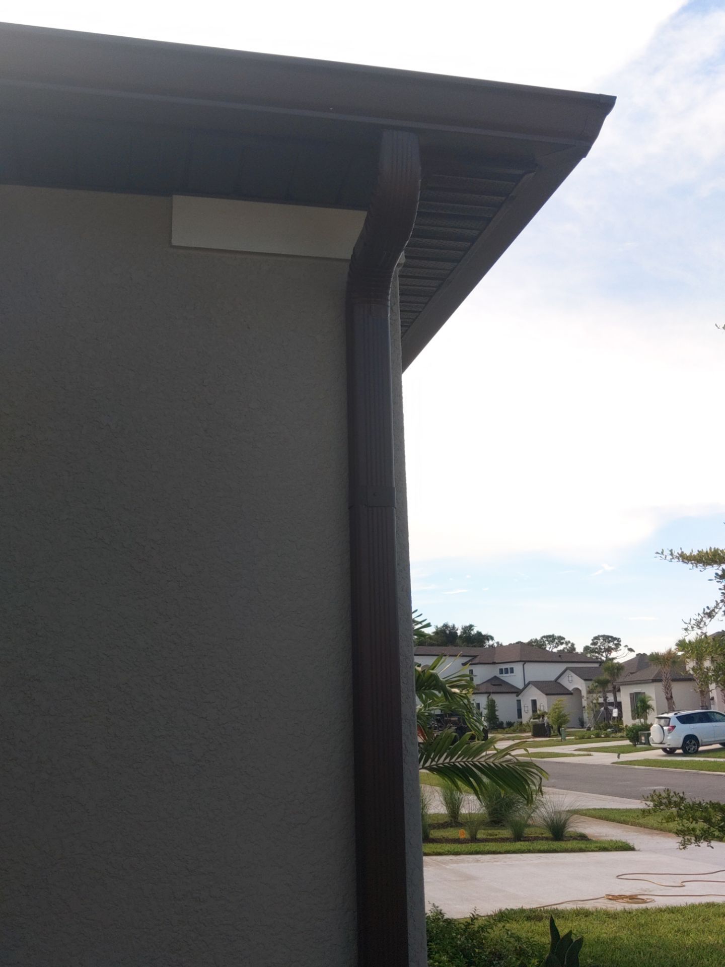 Musket Brown Seamless Gutters using Musket Brown Seamless Gutters in Nokomis FL by Gutter Professors