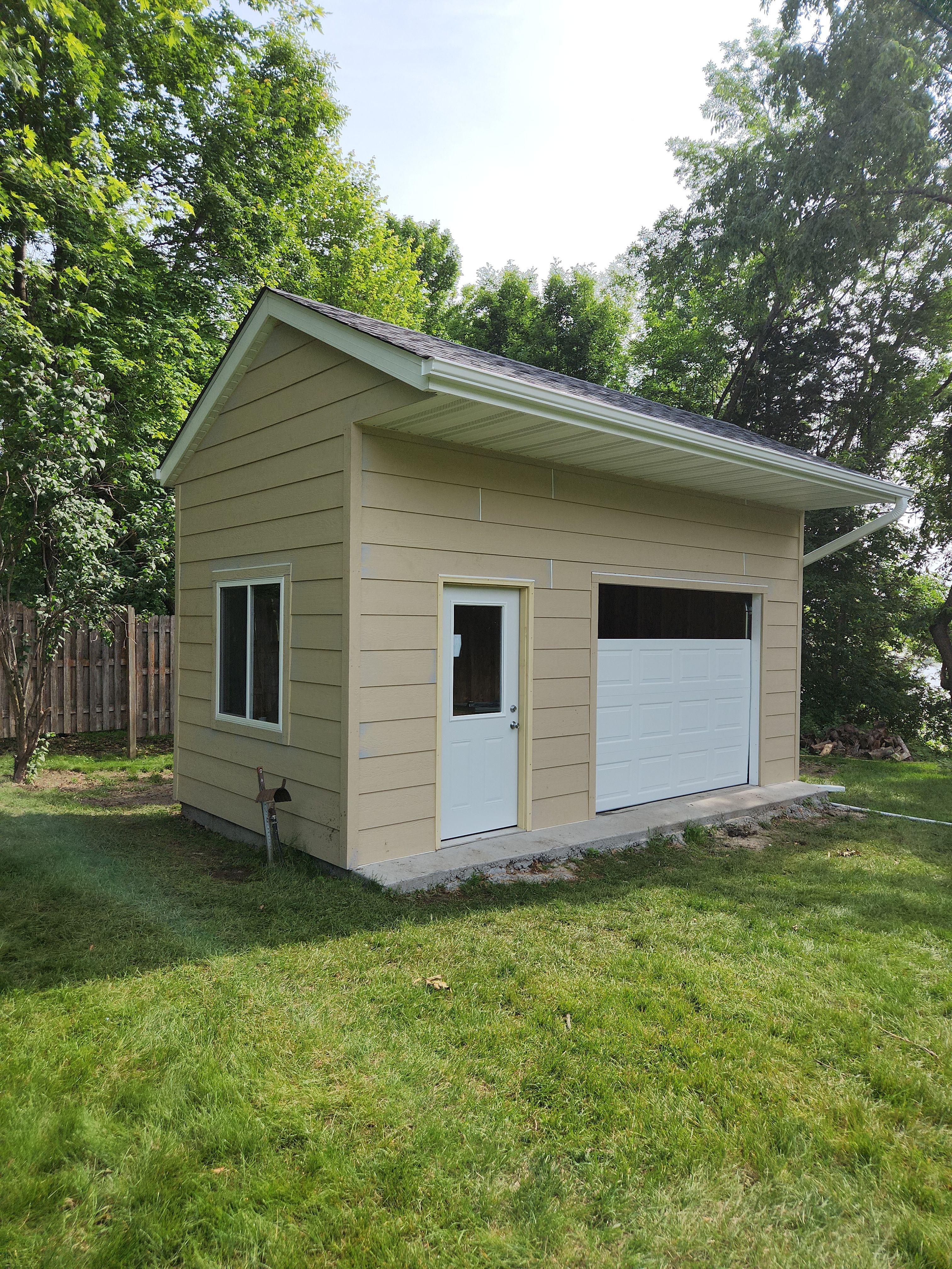 Roofing, Siding & Gutters on Shed Makeover by Next Level Seamless Gutters / Exteriors Inc.