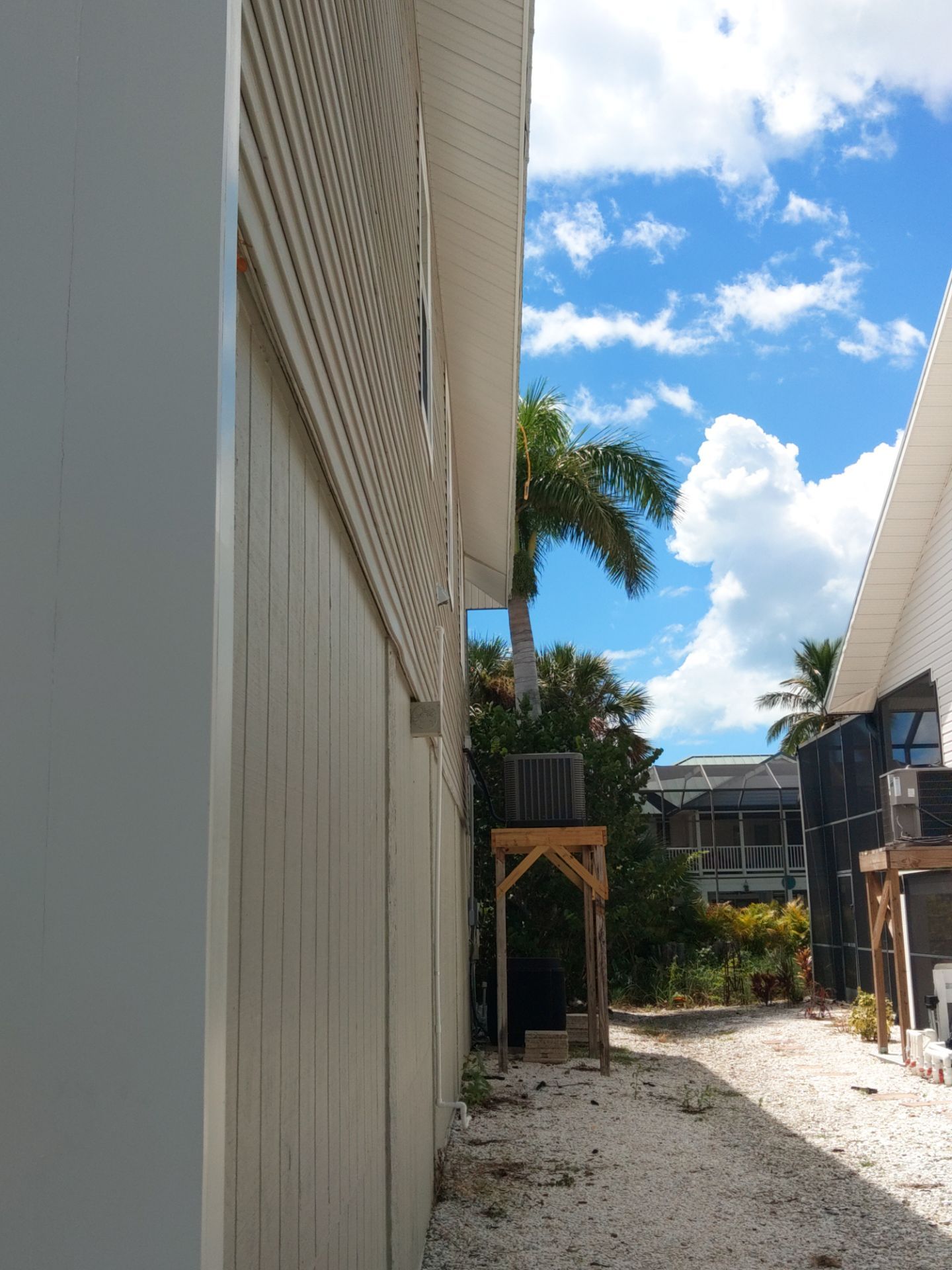 Complete Gutter System with Downspouts & Guards in Fort Myers Beach FL by Gutter Professors