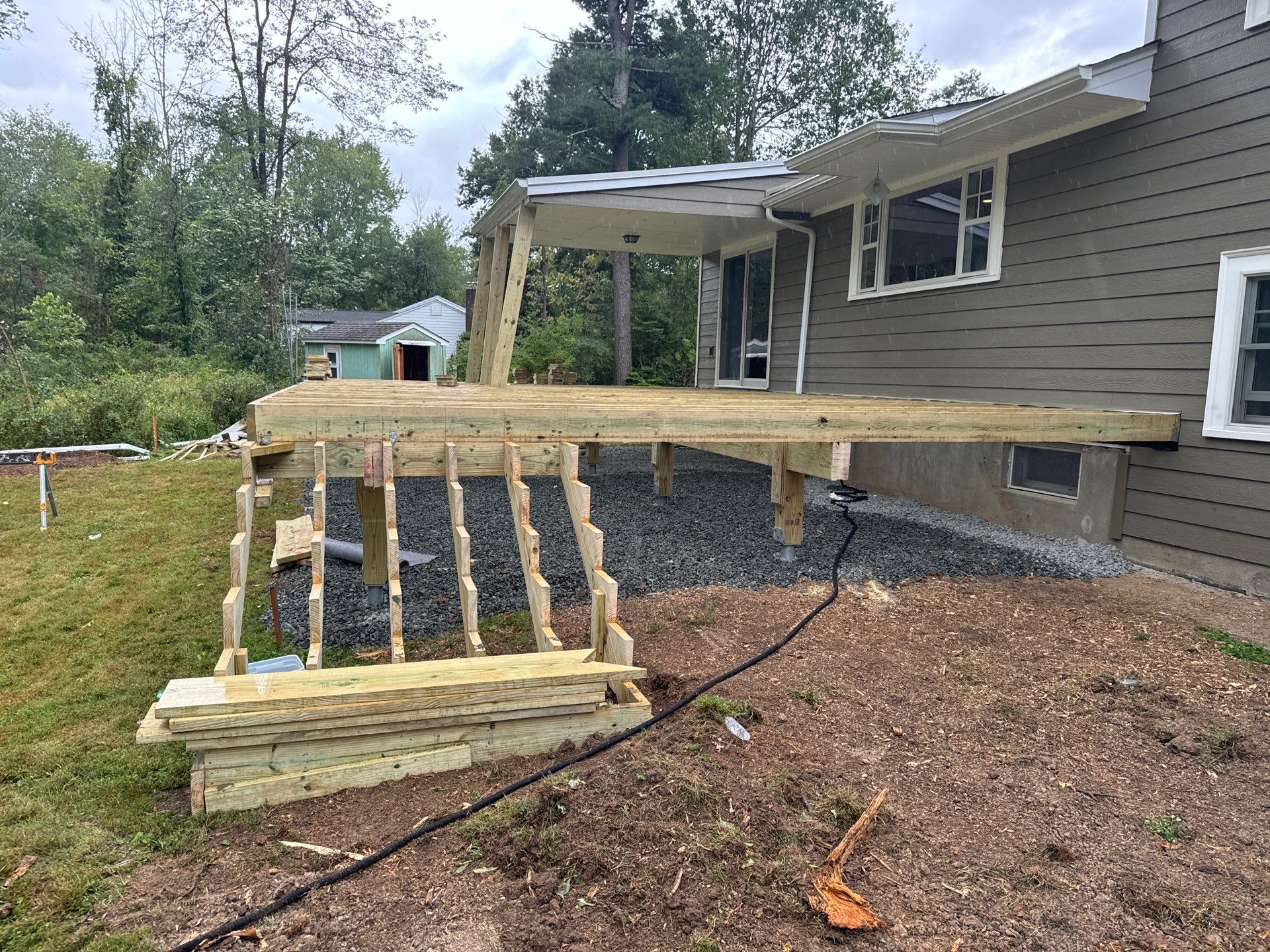 New Deck using Trex Tiki Torch  by deck guardian