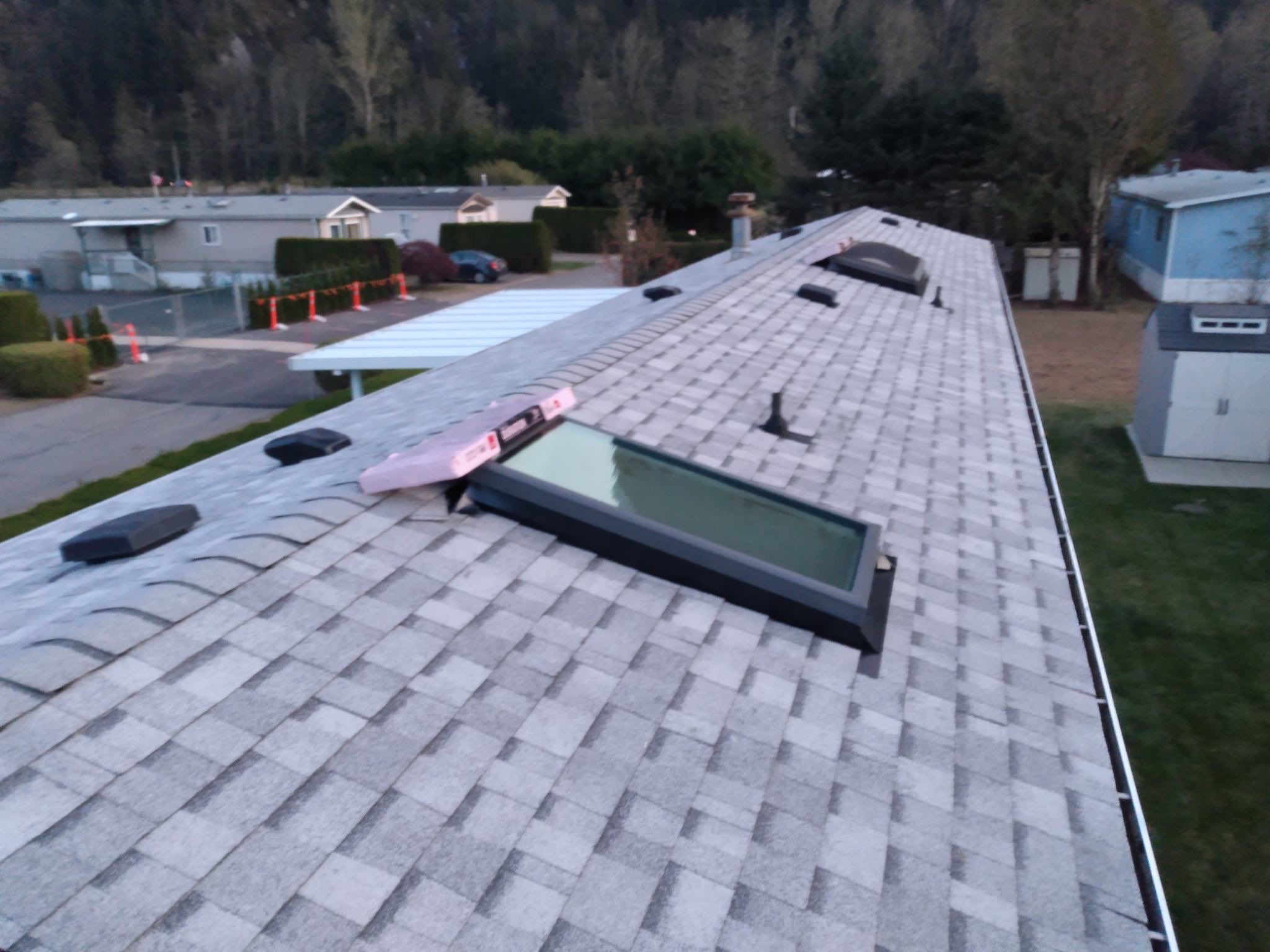 Residential Roofing Installation using OC Oakridge shingles by Top Notch Roofing Inc