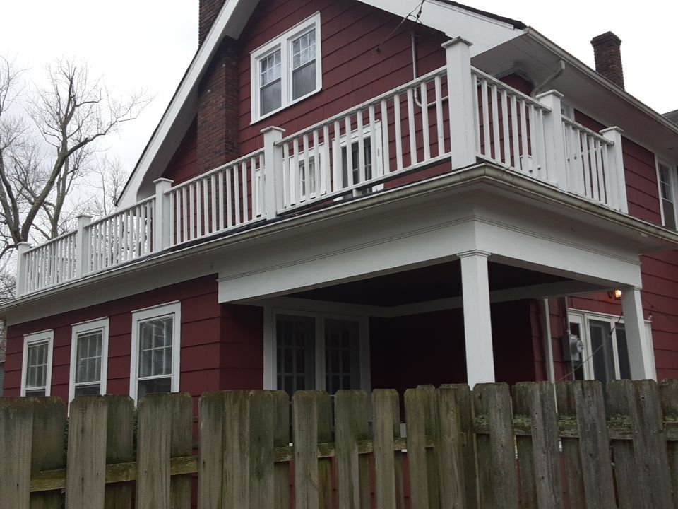 Residential Roof Replacement using Patio Roof by Absolute Roofing and Construction