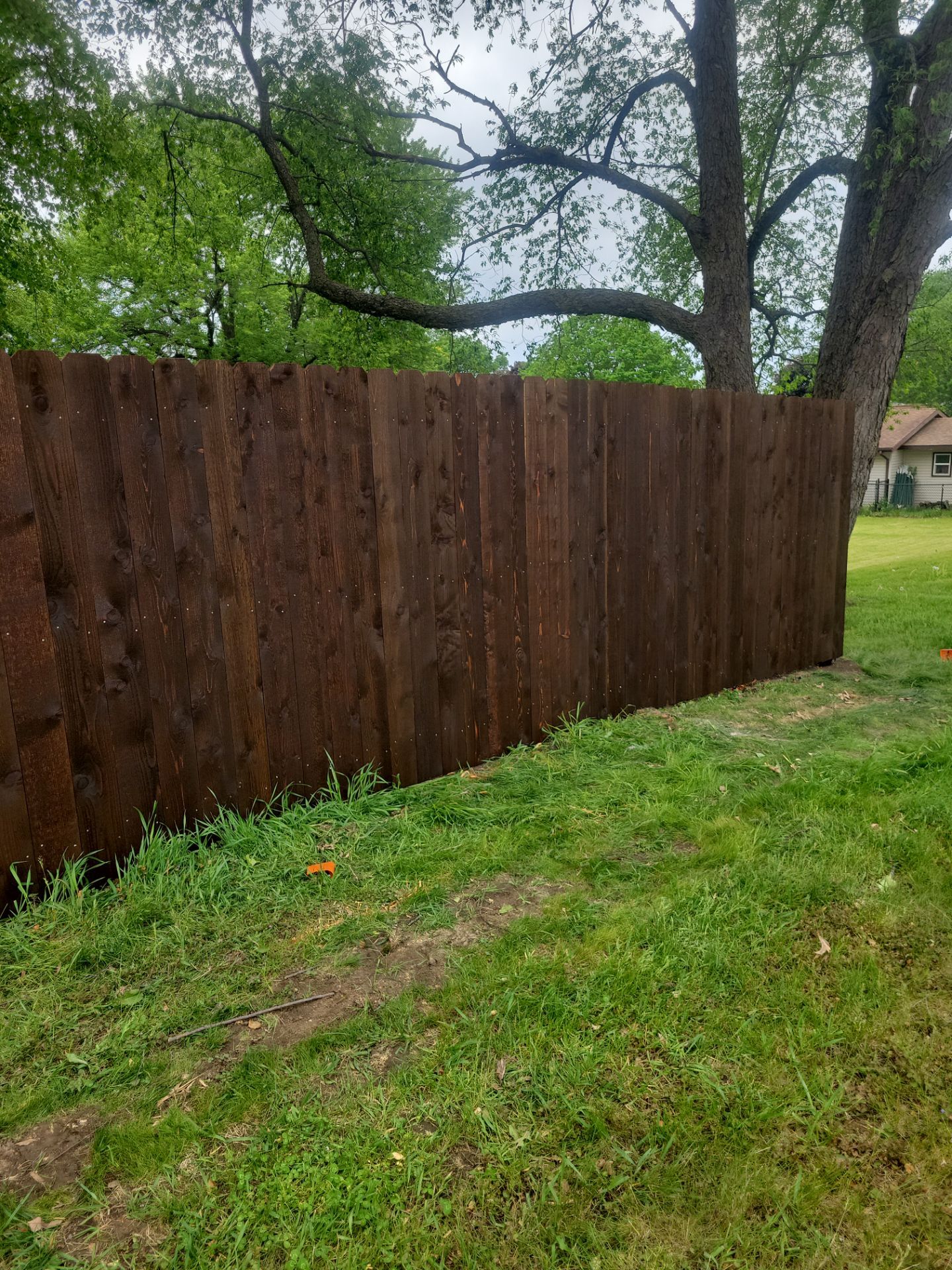 Chain Link and Cedar Privacy in Grundy Center by Perfect Picket Fence and Stain