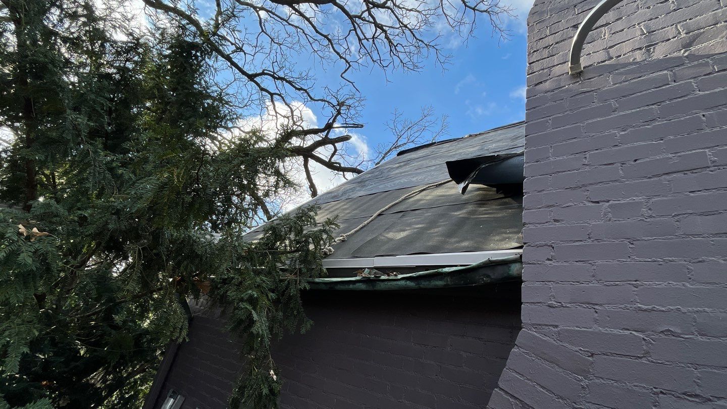 Slate Roof Removal using Atlas Storm Master Slate by Total Exteriors