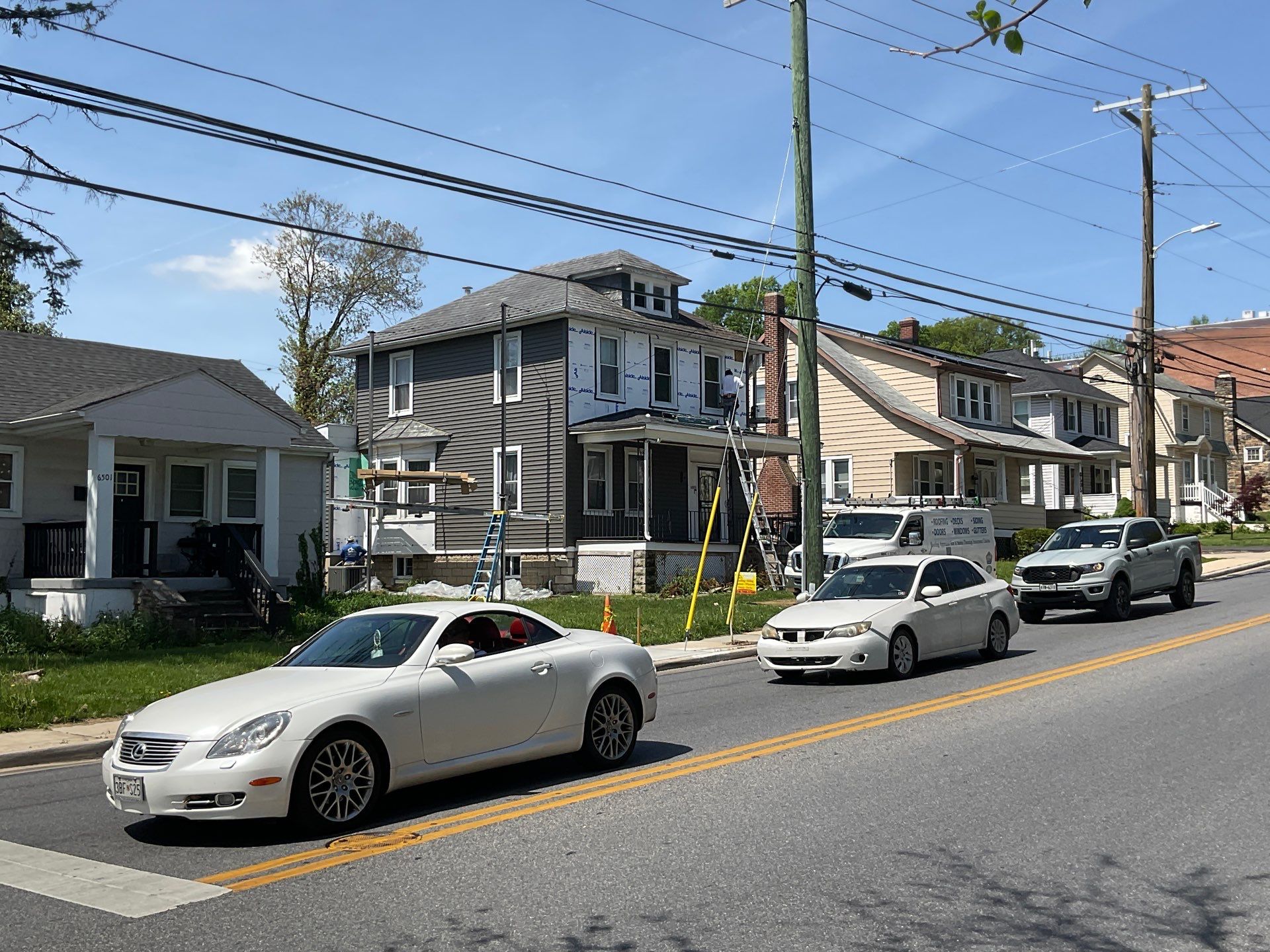 New siding & New Gutters by Alpha Design Services