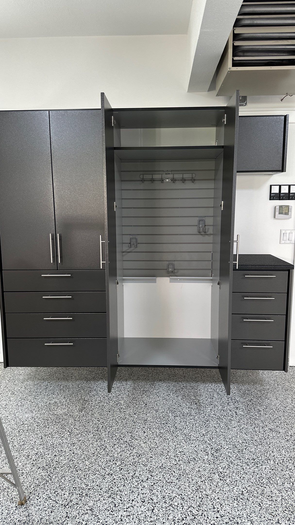 Jim P. upgraded his garage with cabinets  by Banner Garage