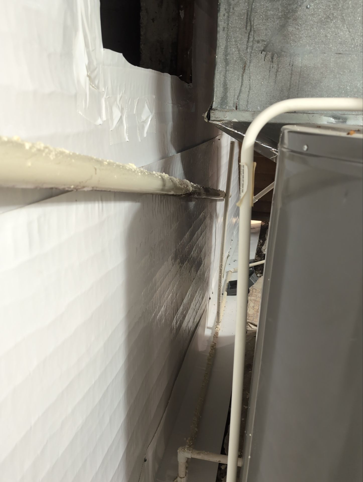 Interior Basement Waterproofing System and Egress Window Installation by Toledo Basement Repair 
