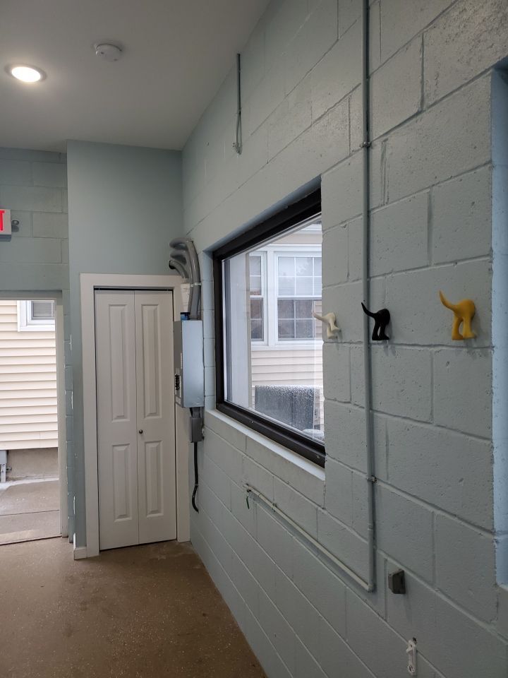 Kennel Floor Coating and Wall Painting using Penntek by Spectrum Painting, LLC