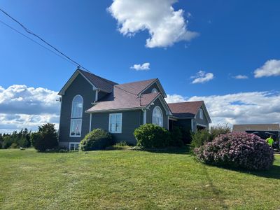 Residential Roofing Installation using Wakefield Bridge Steel Shingle by Ideal Steel