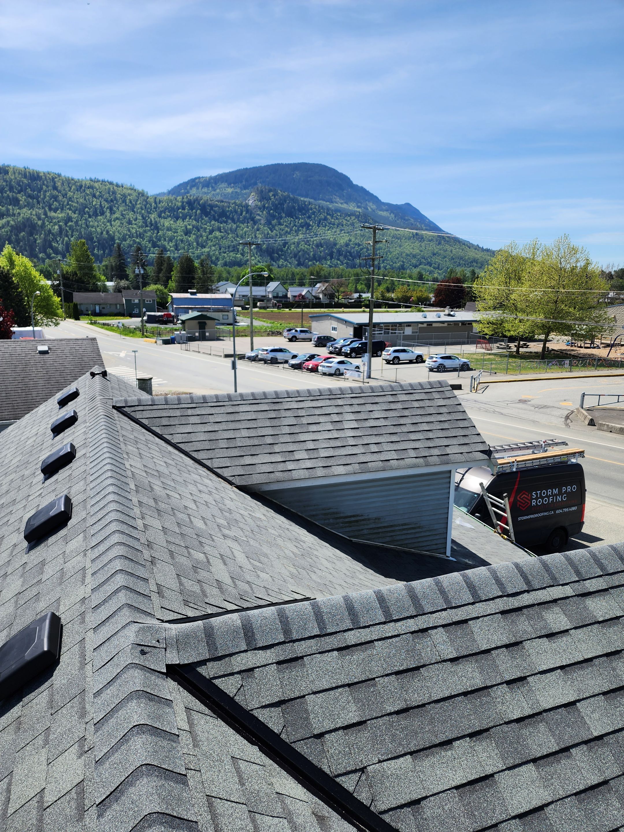 Residential Roofing Installation using Estate Gray Shingles by Top Notch Roofing Inc