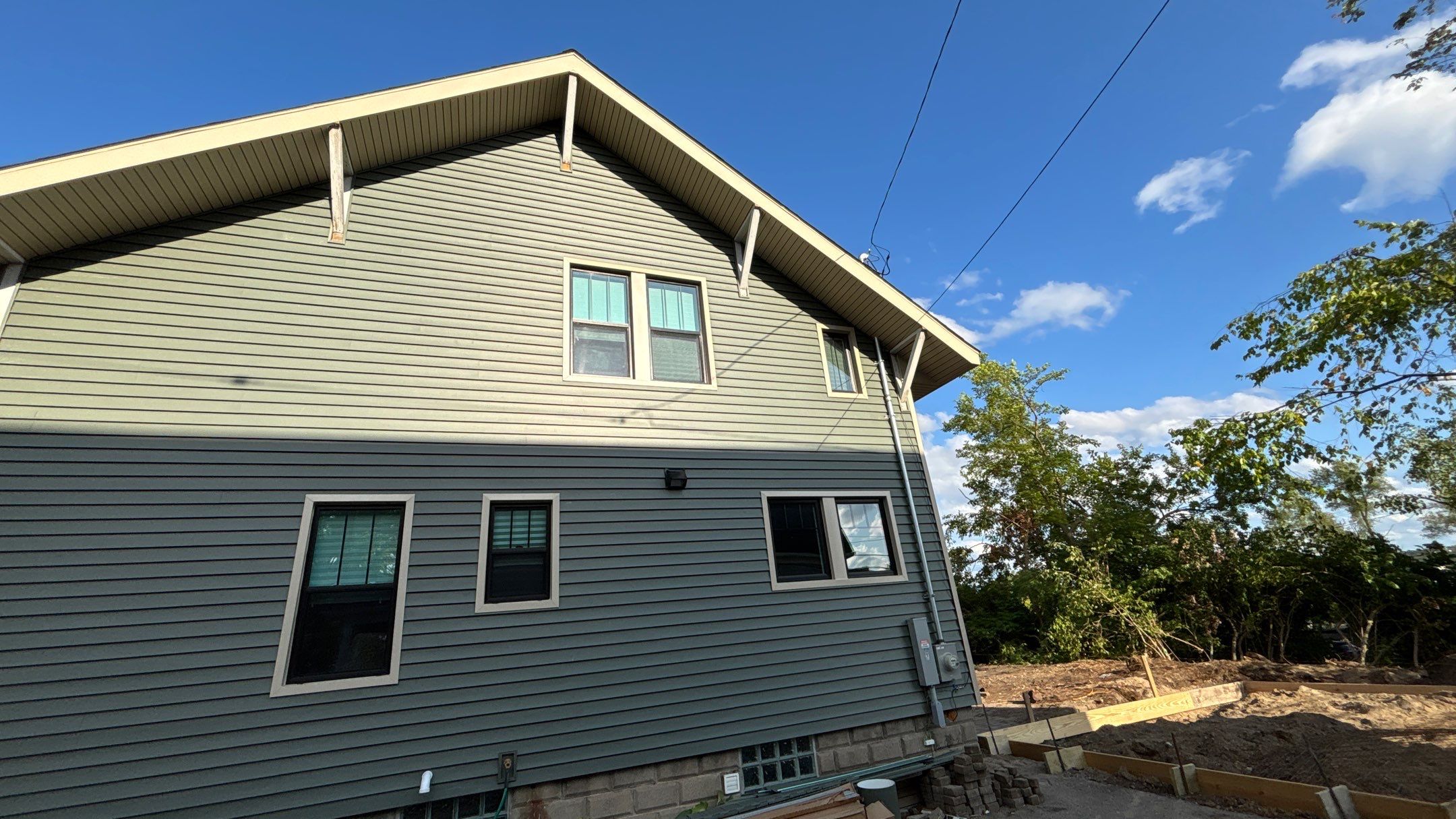 Siding Replacement using Alside Charter Oak D4.5" Deep Moss by 180 Contractors