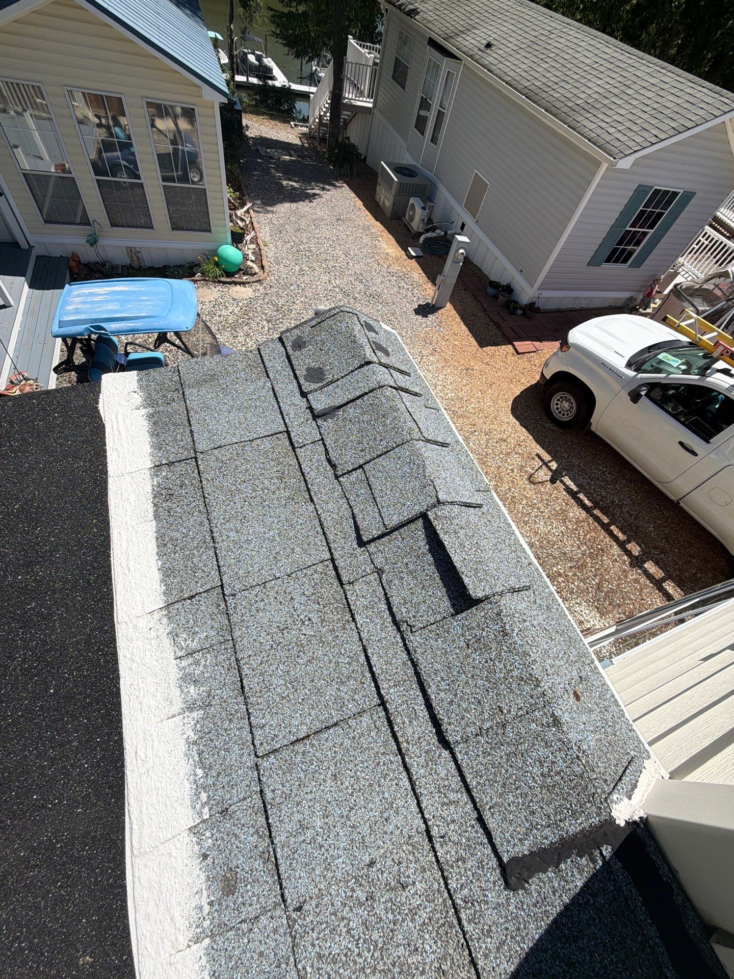 White Standing Seam Metal Roof Installation in Wake, VA by Cade Construction