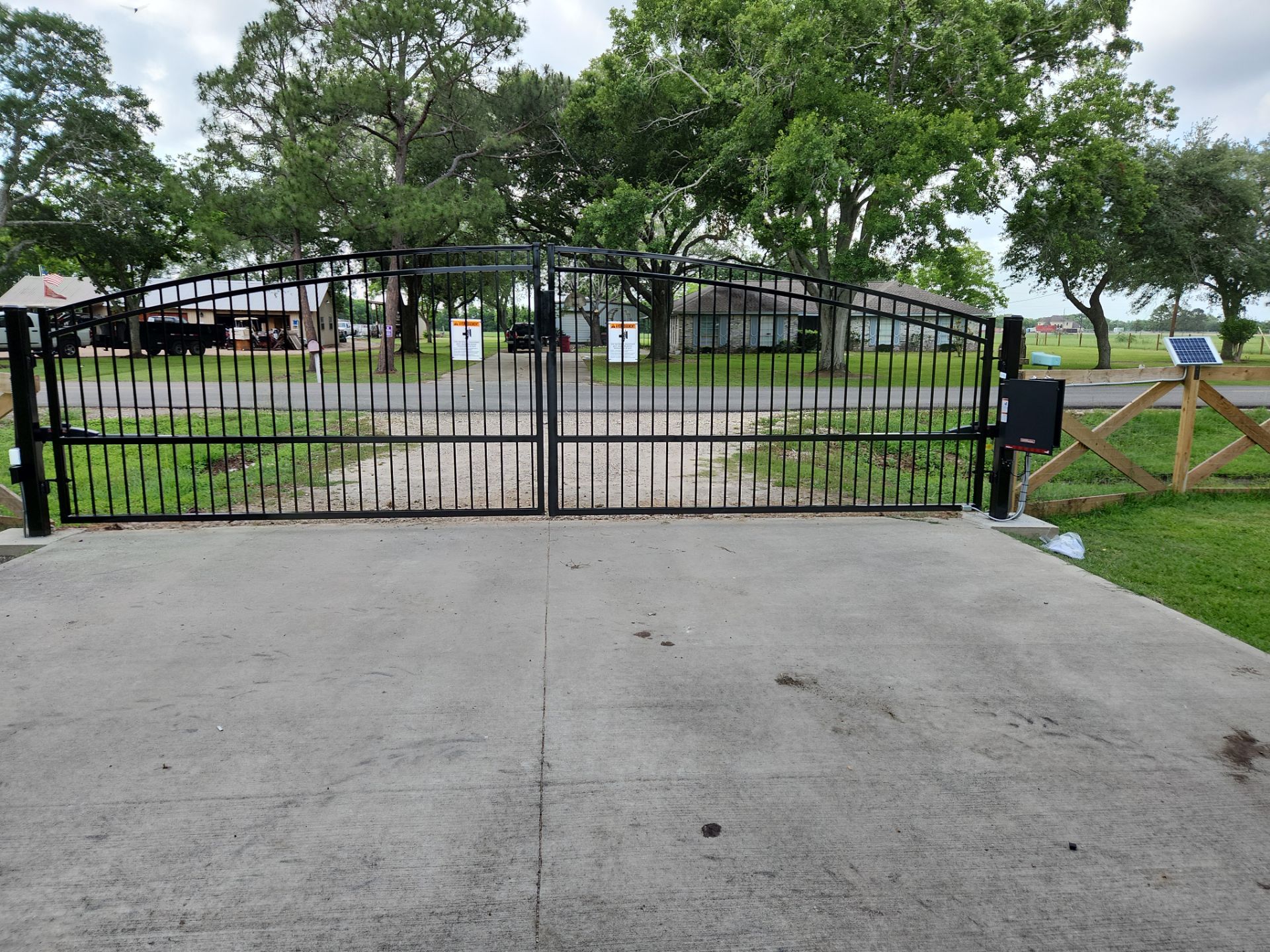 Custom Driveway Gate Powered by Solar by Tim's Fences