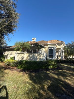 Clean Gutters Entire House and reseal corners in Sarasota FL