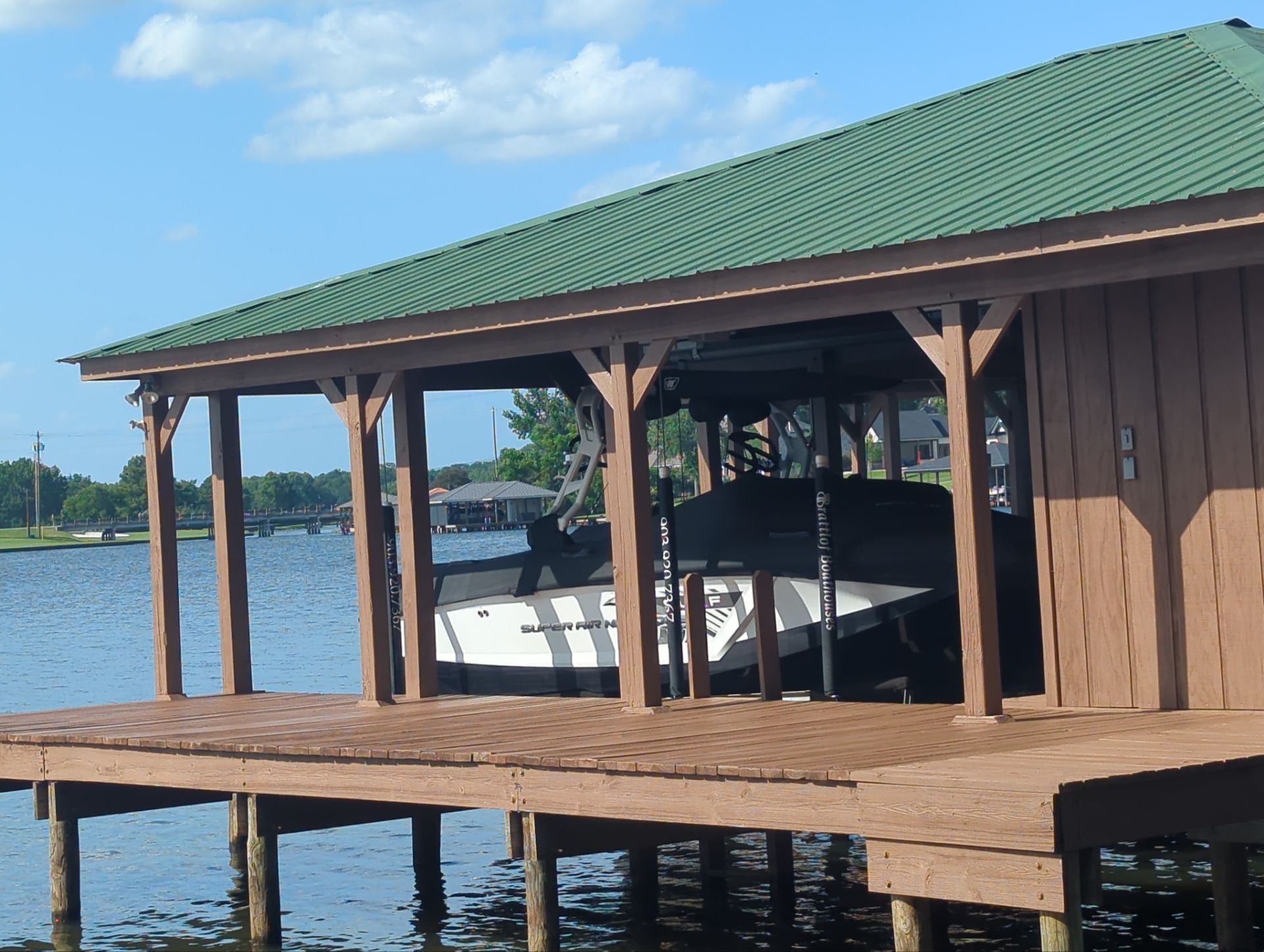 Lake House Deck Restaining in Flint, Texas by Quality Coats Painting