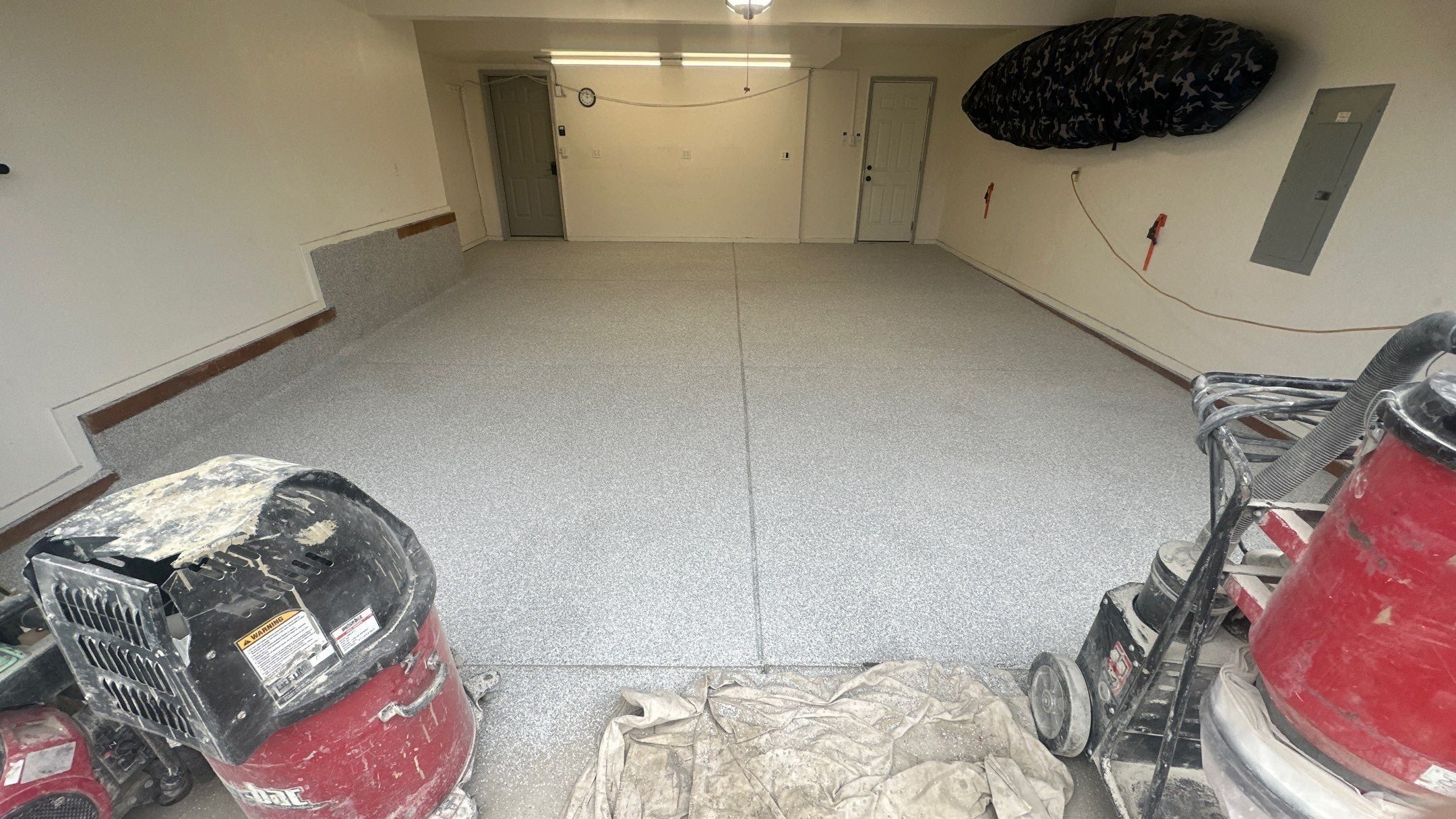 Garage Transformation using 1/8 Tidal Wave by Croc Coatings, LLC