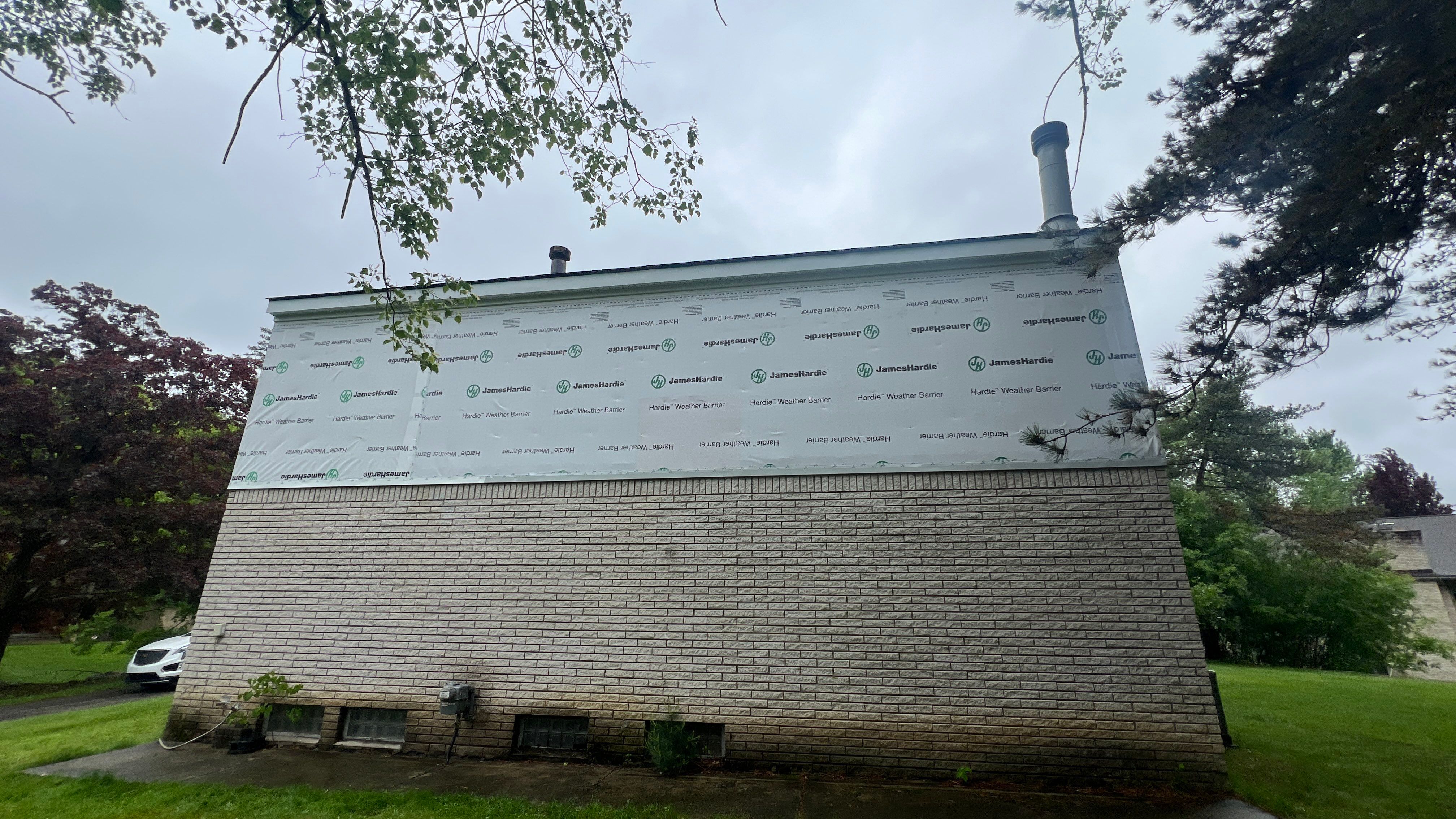 James Hardie Siding Replacement by Bloomfield Construction & Restoration