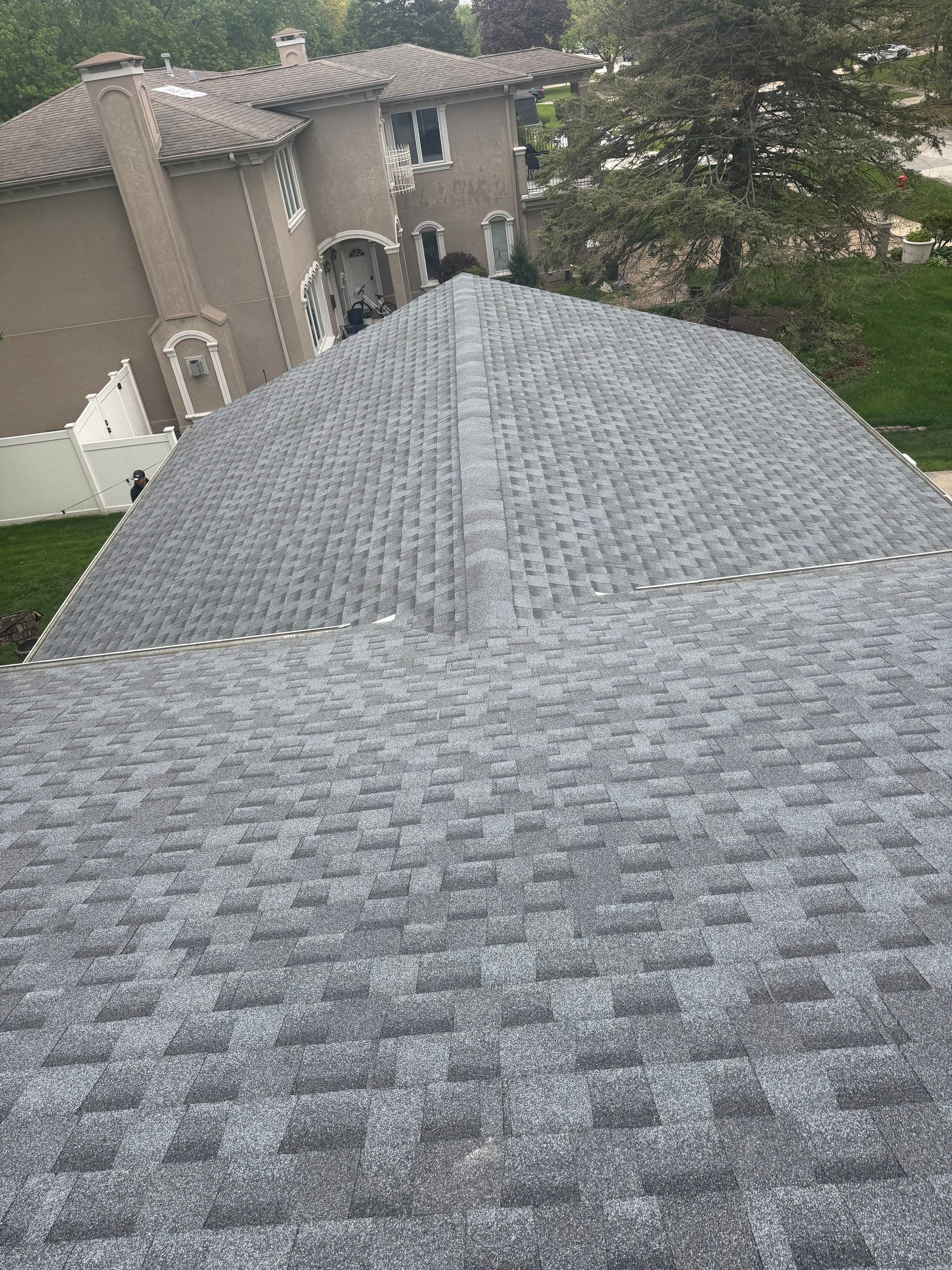 Roof replacement and chimney flashing by Optimal Home Improvement 