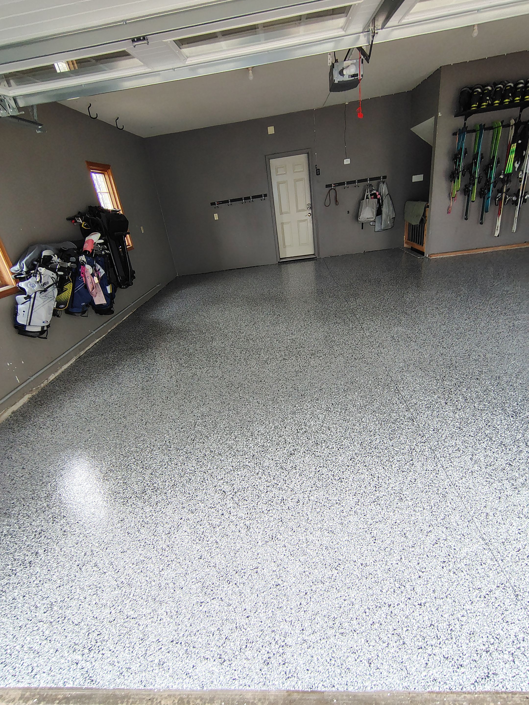 Garage Floor Concrete Coating and Crack Repair in Sioux Falls by Select Painting, Coatings & Garage Cabinets