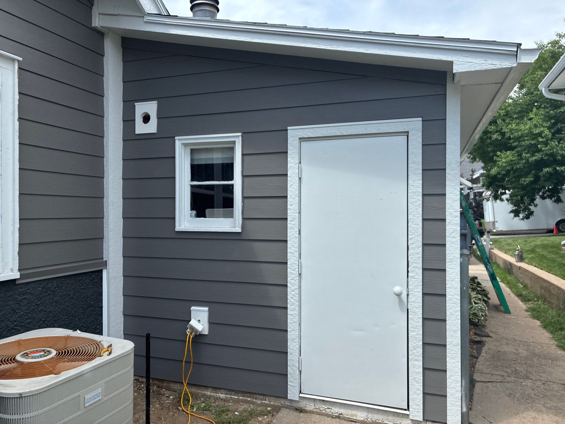 James Hardie Iron Gray Siding Replacement for Omaha Home by Carps Complete Exteriors 