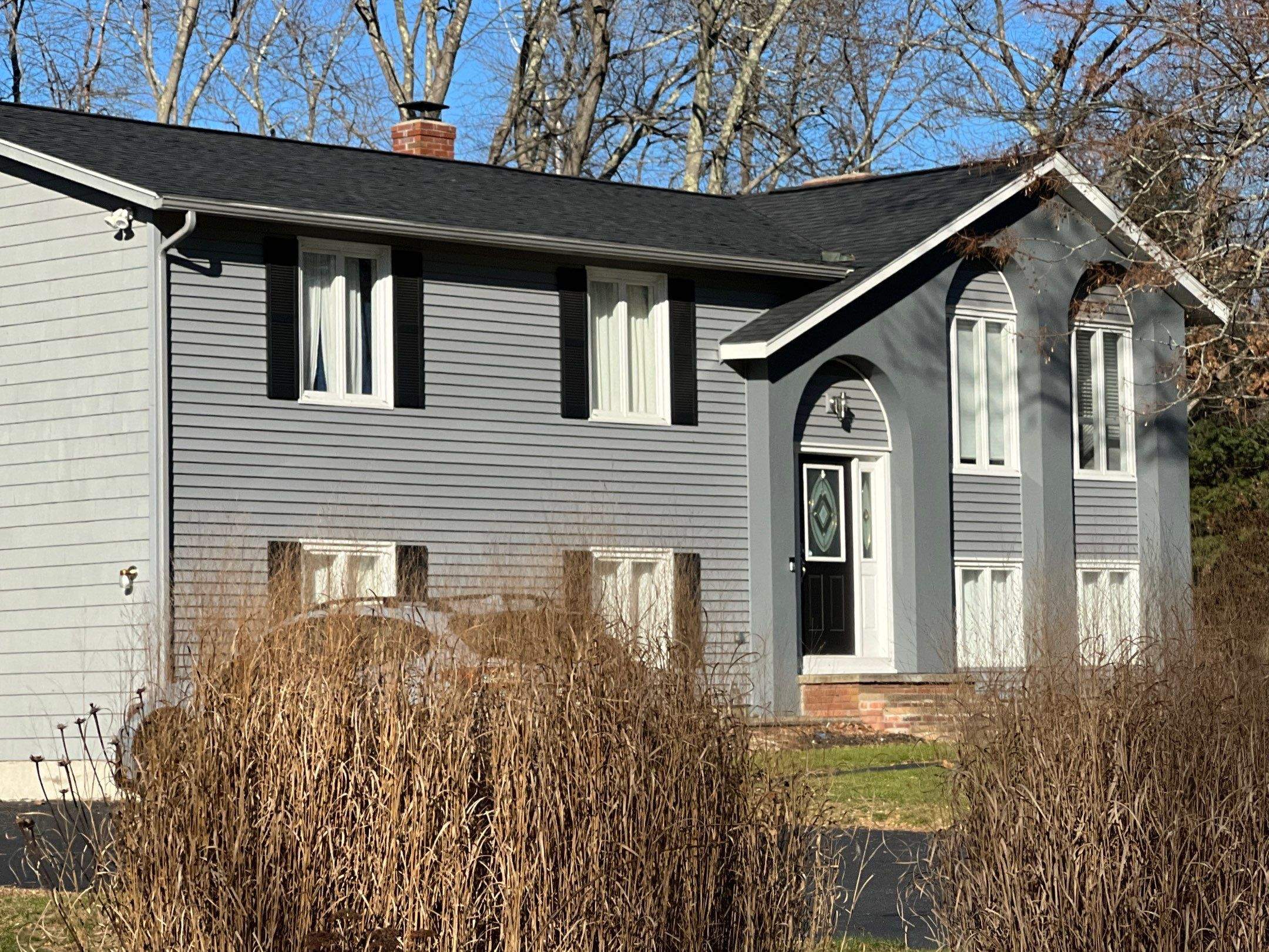 Charcoal Black Roofs by Pinnacle Roofing & Skylights
