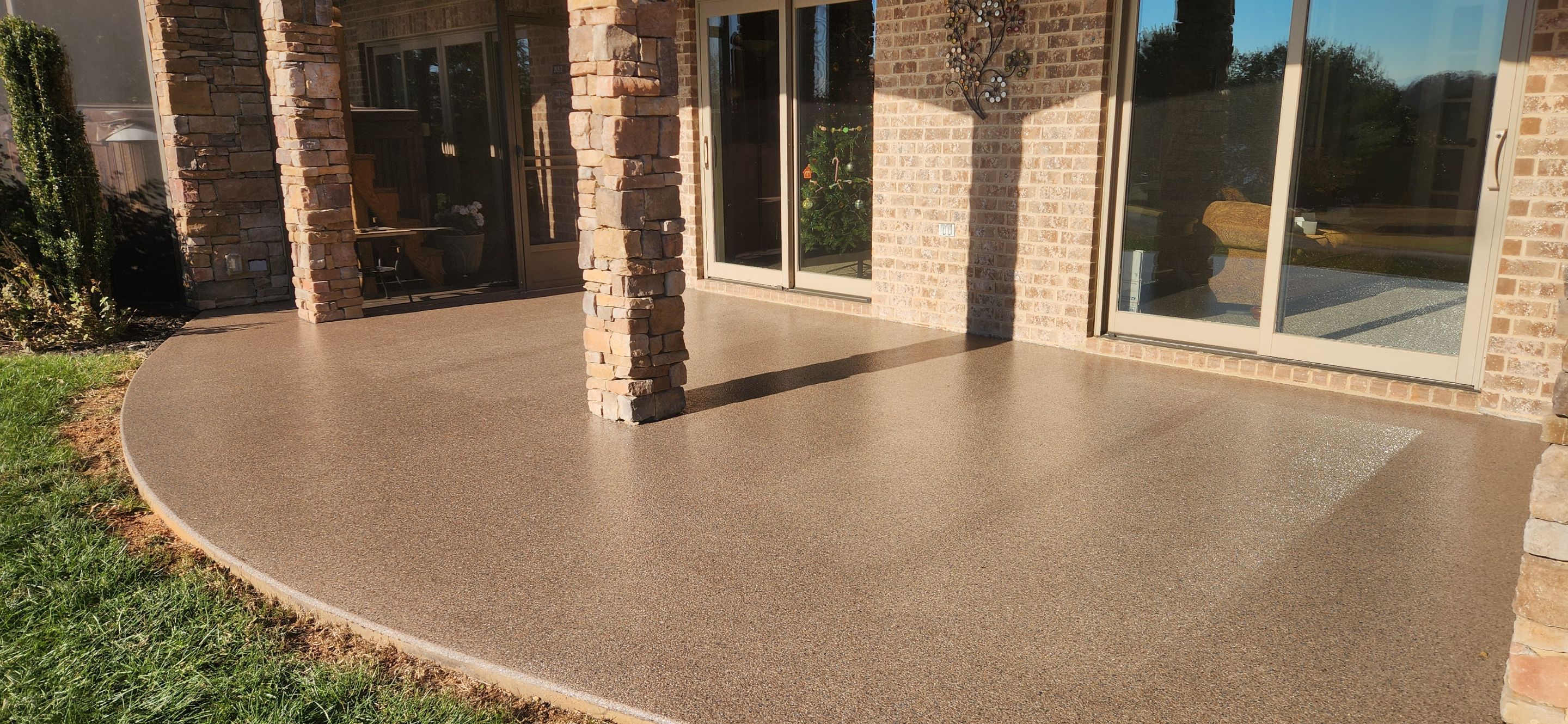 Garage & Back Patio Upgrade with Obsidian & Garnet by Elite Floor Solutions