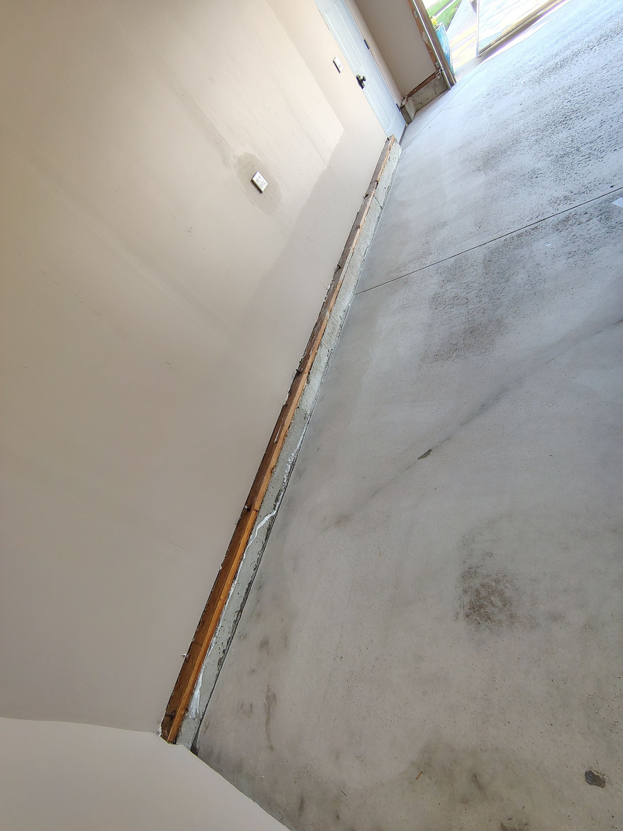 Sioux Falls Garage Concrete Repair and Epoxy Flake Floor Coating by Select Painting, Coatings & Garage Cabinets
