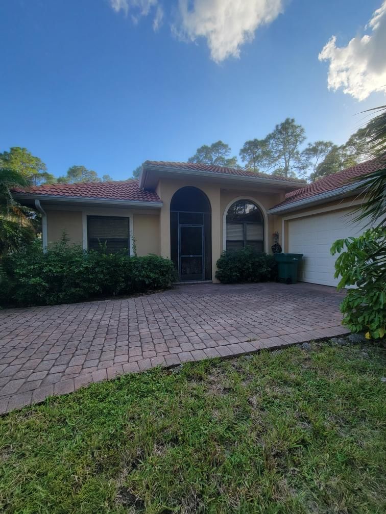New Splash Guards and 6-Inch seamless Gutters in Naples FL by Gutter Professors
