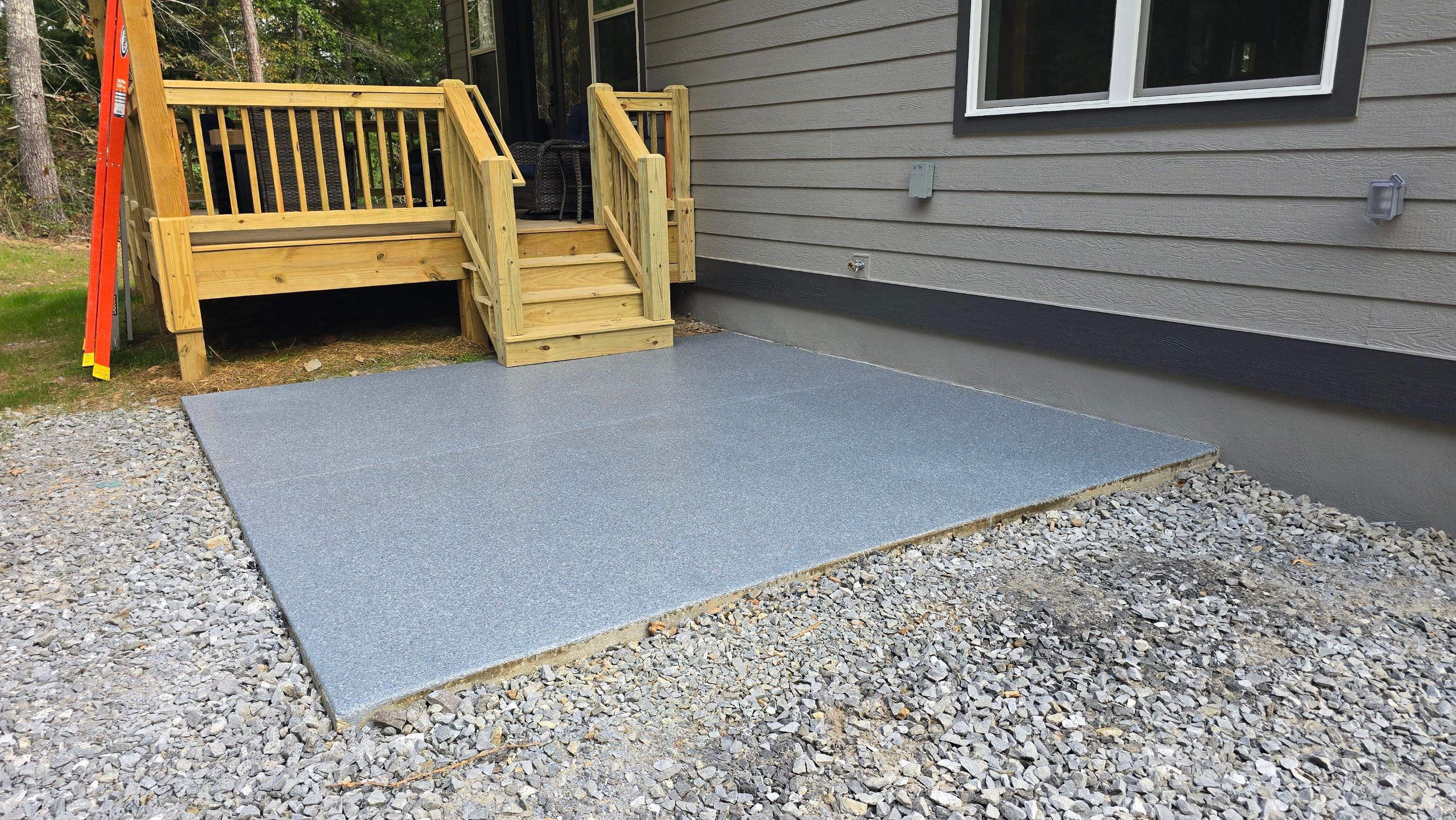 Patio Using Basalt & Garage Using Gravel by Elite Floor Solutions