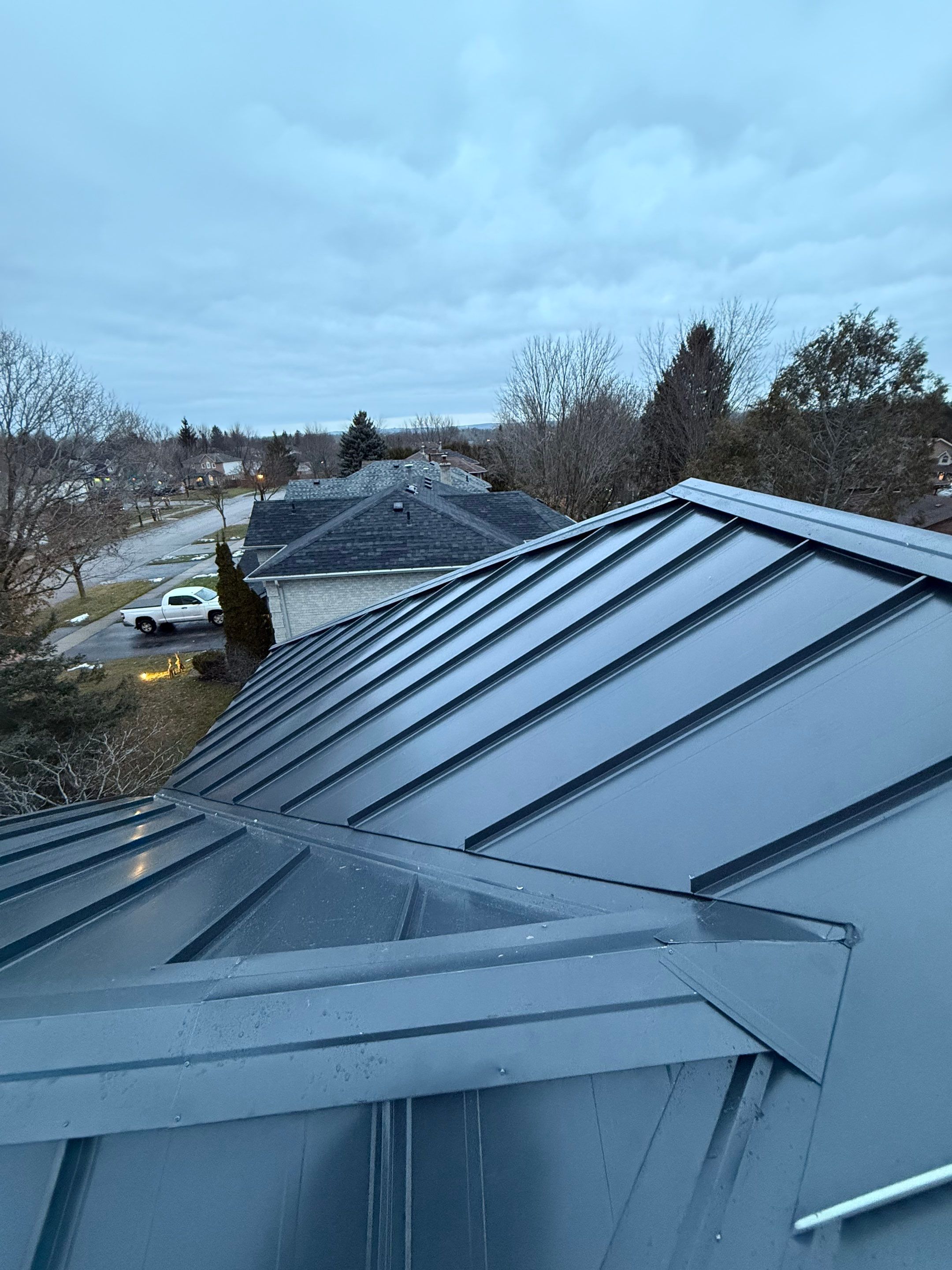 Roof Replacement using 16" Standing Seam Panels by Jay Carter Roofing & Sheet Metal