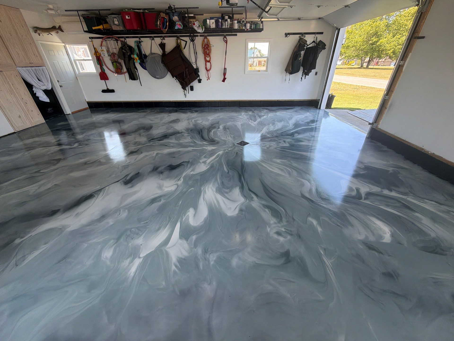 Custom Metallic Epoxy Floor and Polished Countertop Installation in Mears by Gordon Painting