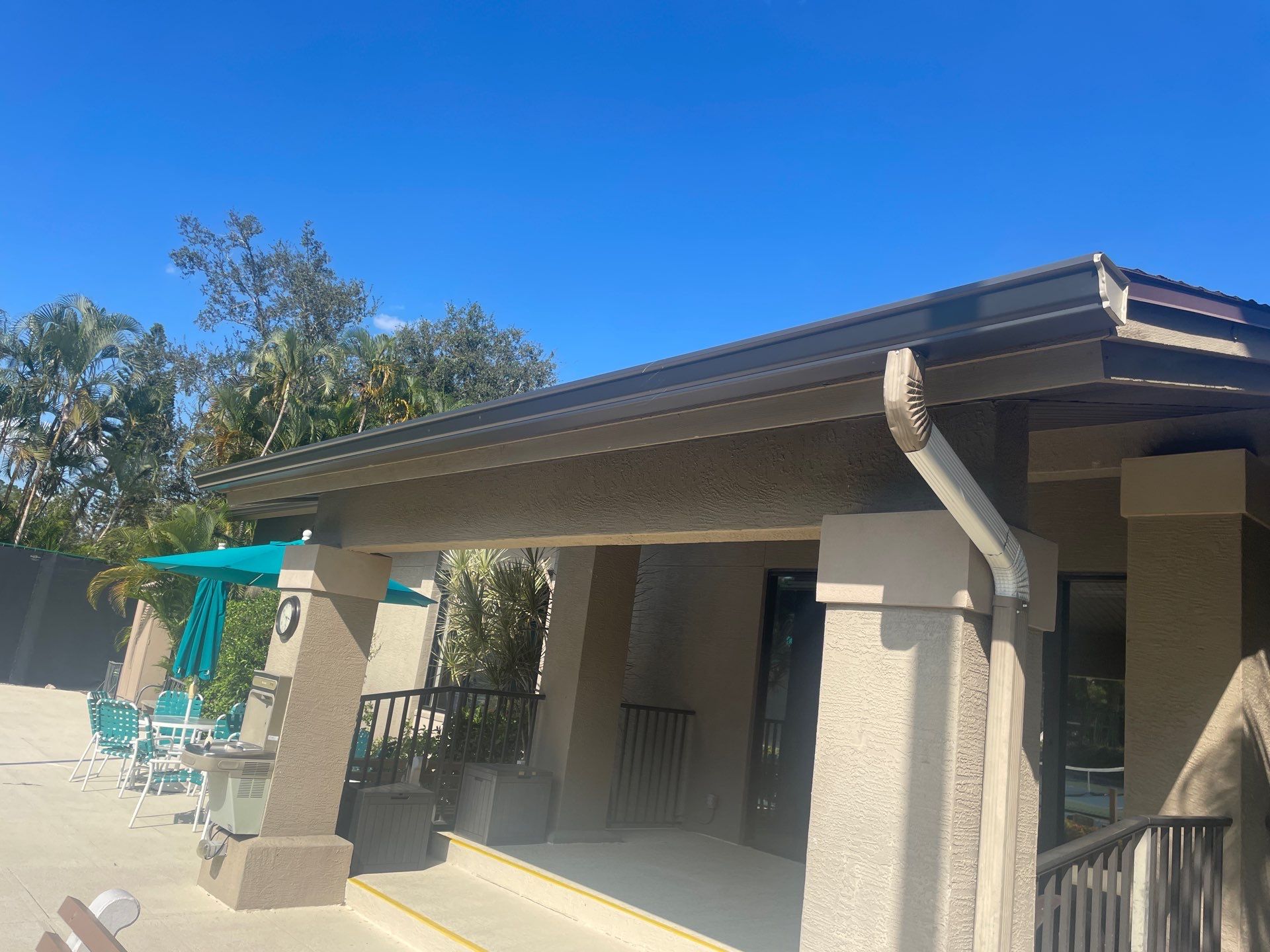 Clean Gutters and Roof in Sarasota FL by Gutter Professors