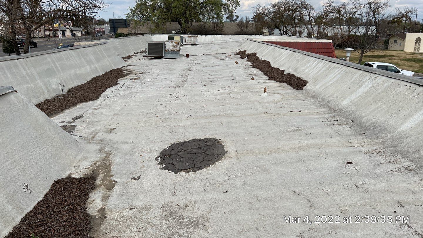 Commercial Roofing Installation using General Coatings acrylic coatings and spray foam by Straight Edge Roofing Inc