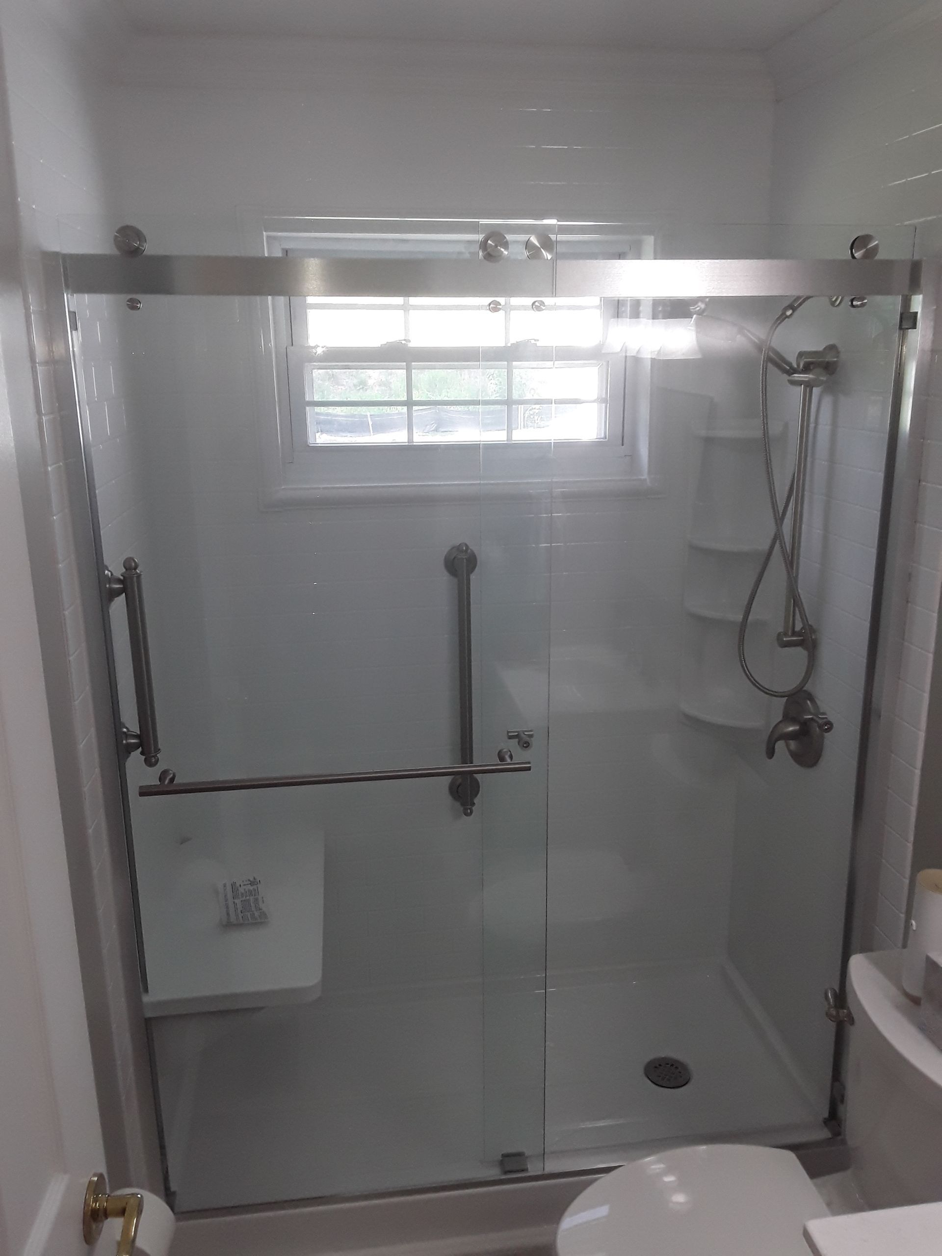 Tub to Shower Conversion using BCI Acrylic Shower System by Secure Construction Company Inc