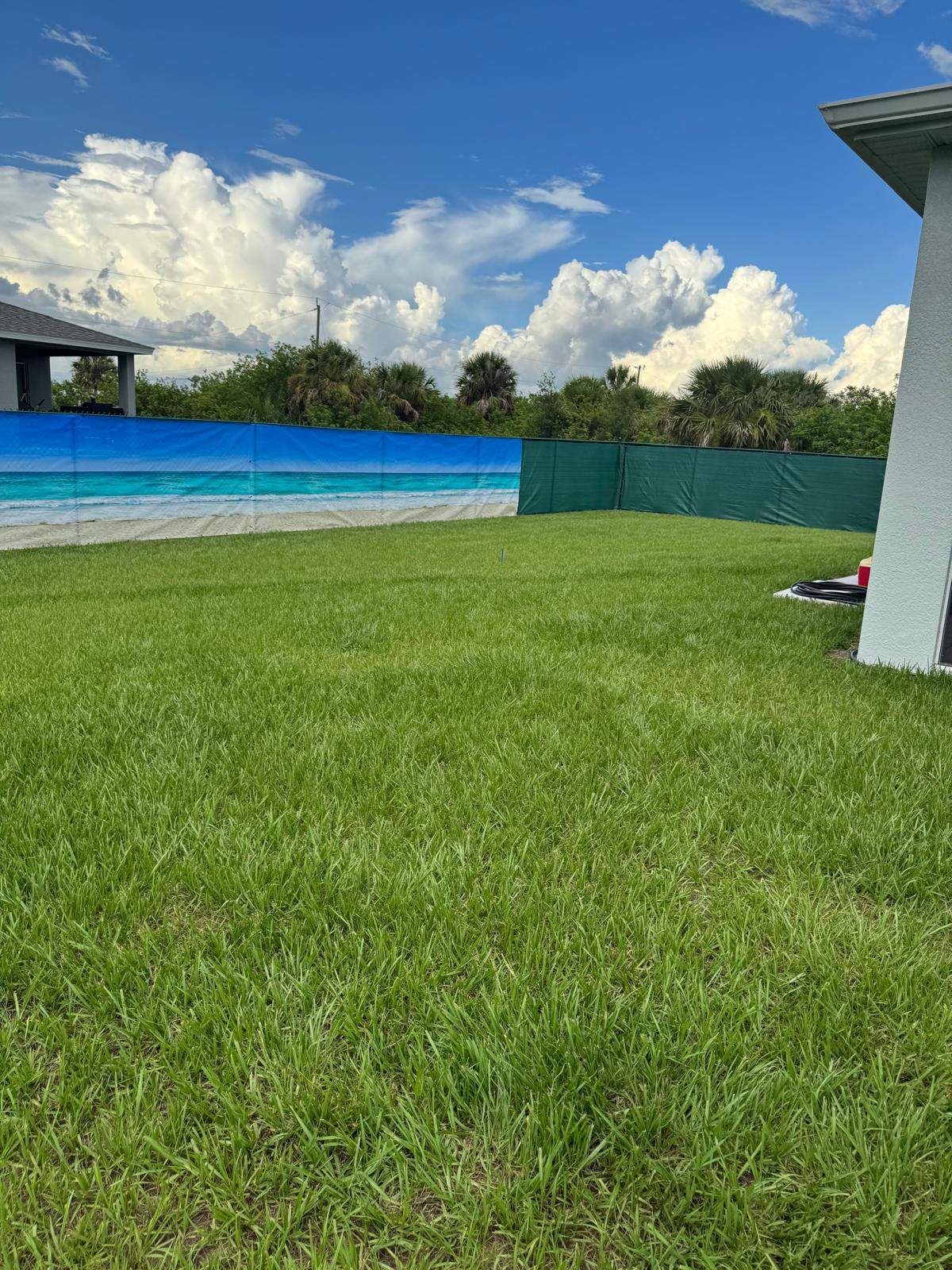 Chain Link Fence Installation with Custom Beach Privacy Screen in Port Charlotte by True Fence LLC