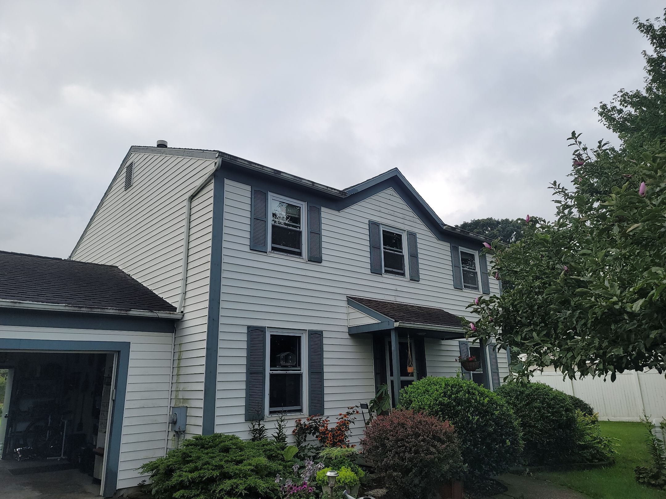Atlas Pinnacle, Color: Weathered Wood, Drip Edge, Color: Royal Brown by Eagle Eye Roofing