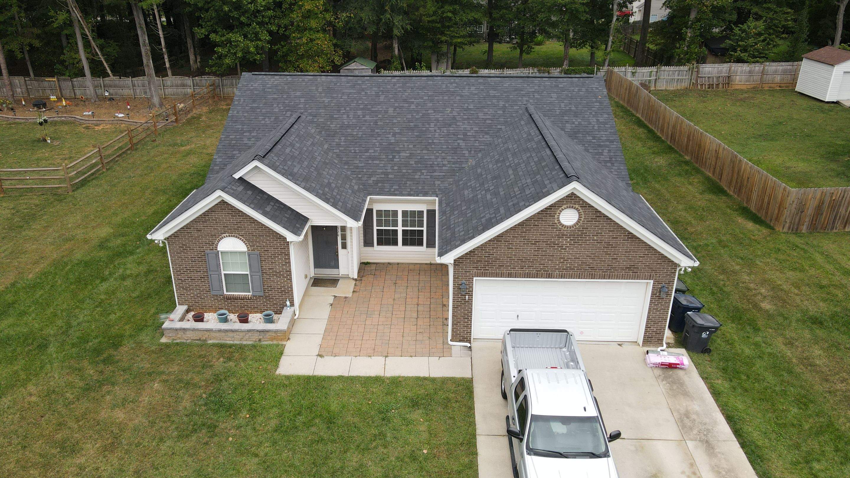 Residential Roofing Installation using Owens Corning Oakridge Onyx Black by RISE Roofing & Restoration, LLC