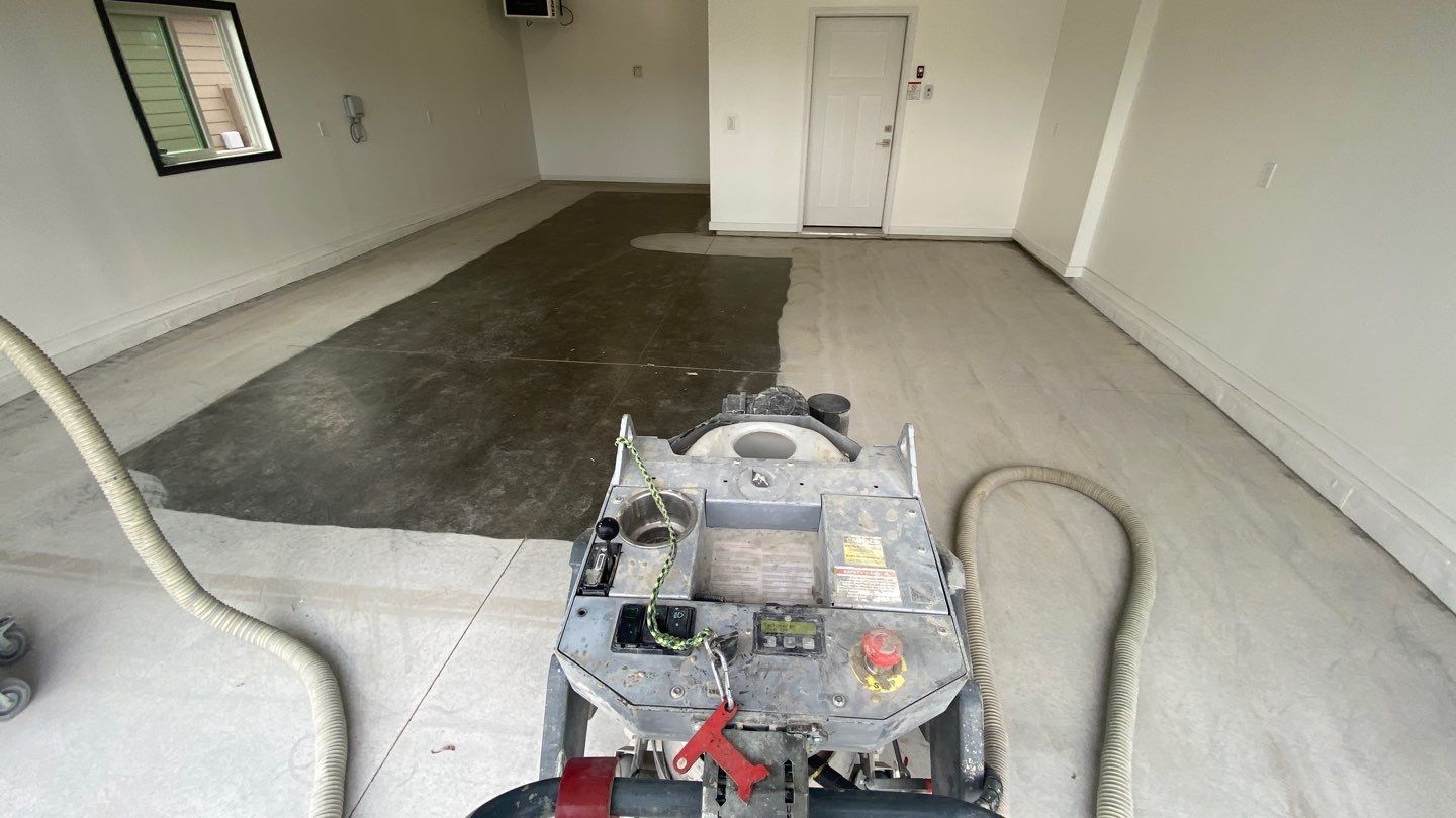 Garage using Slate Stone by Select Painting, Coatings & Garage Cabinets