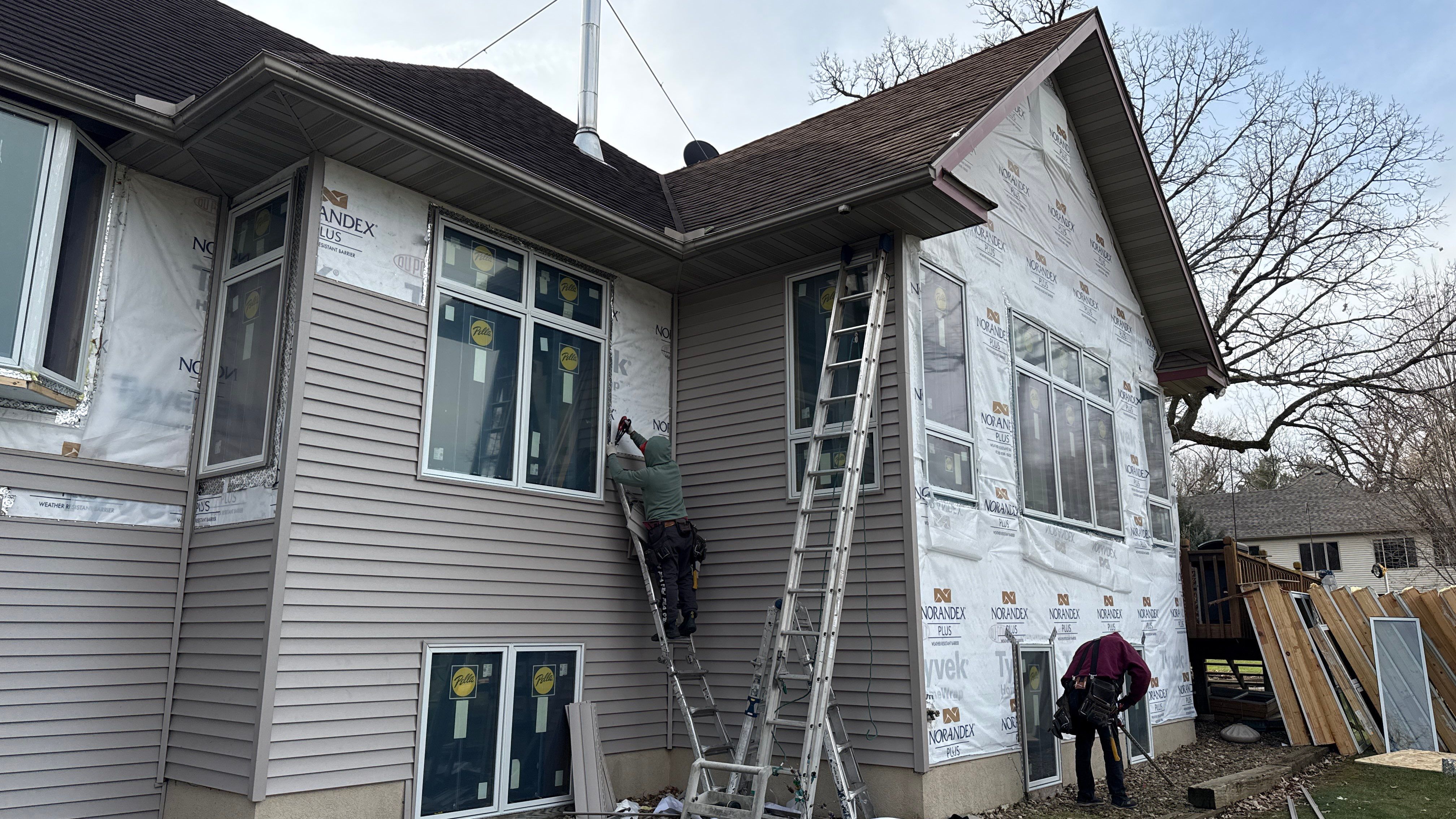 A Clean Window Upgrade Ready for New Siding with Pella Lifestyle Series by United Windows and Siding LLC