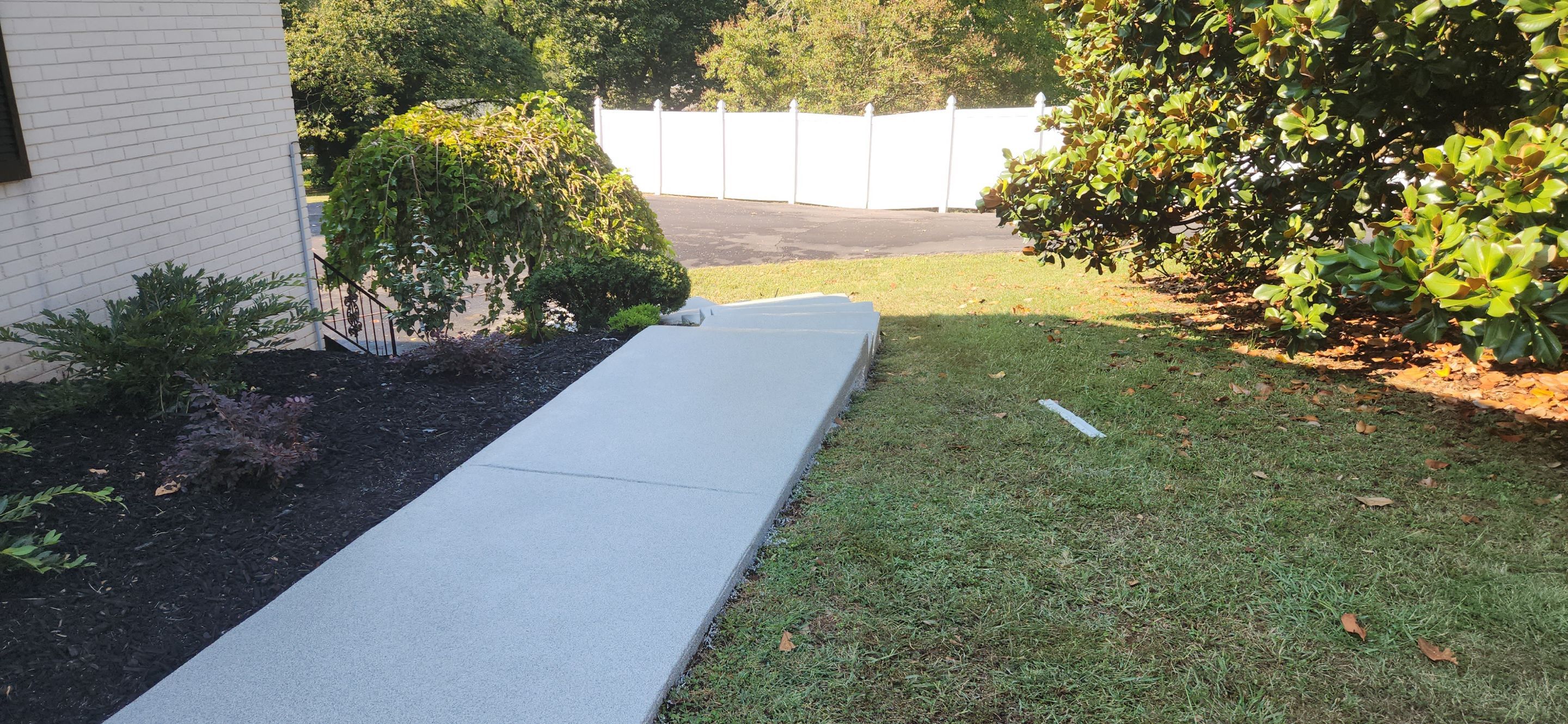 Sidewalk & Garage using Dovetail by Elite Floor Solutions