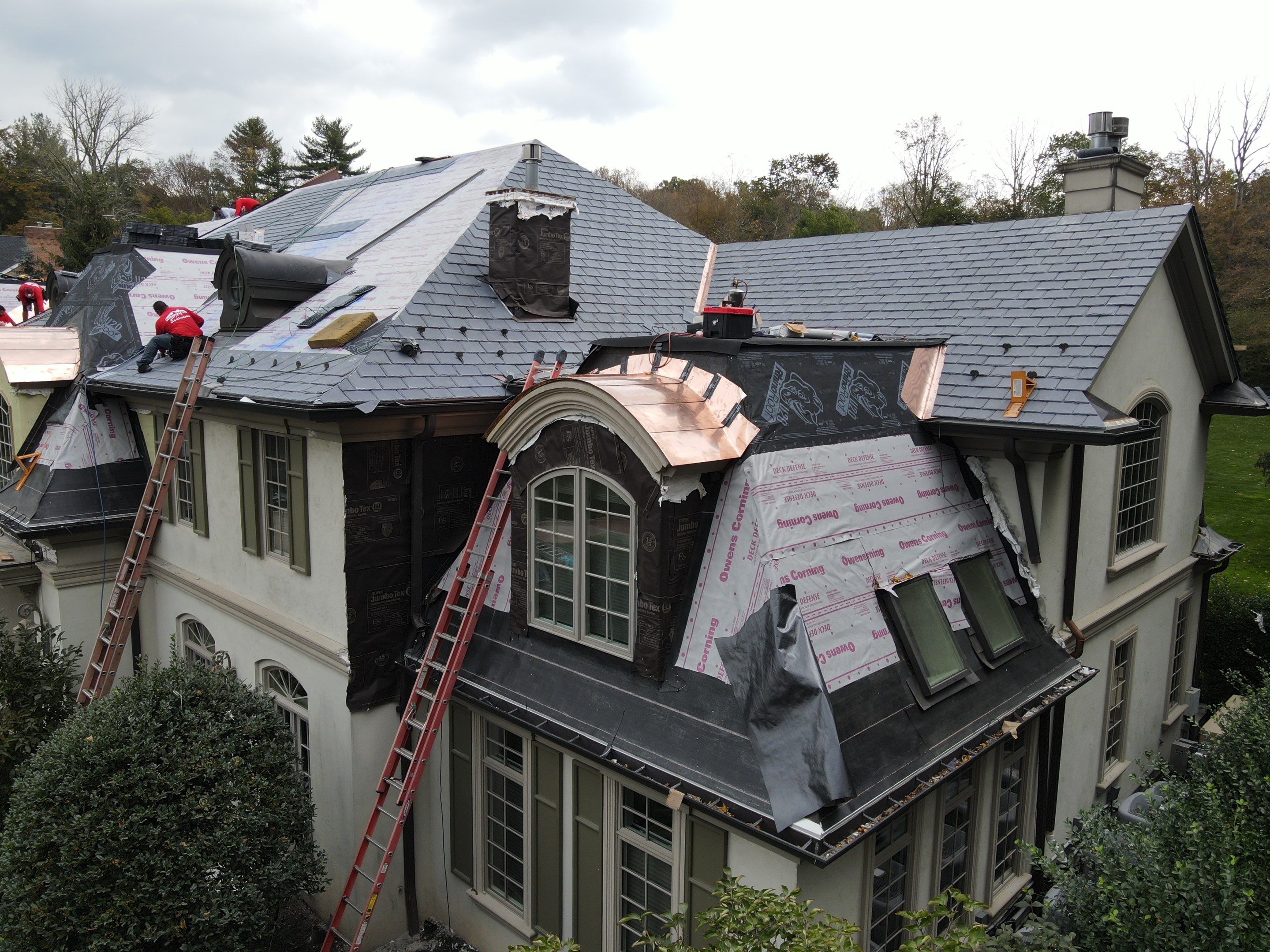 Full Slate - Stucco - Copper Remodel by USA Roof Masters