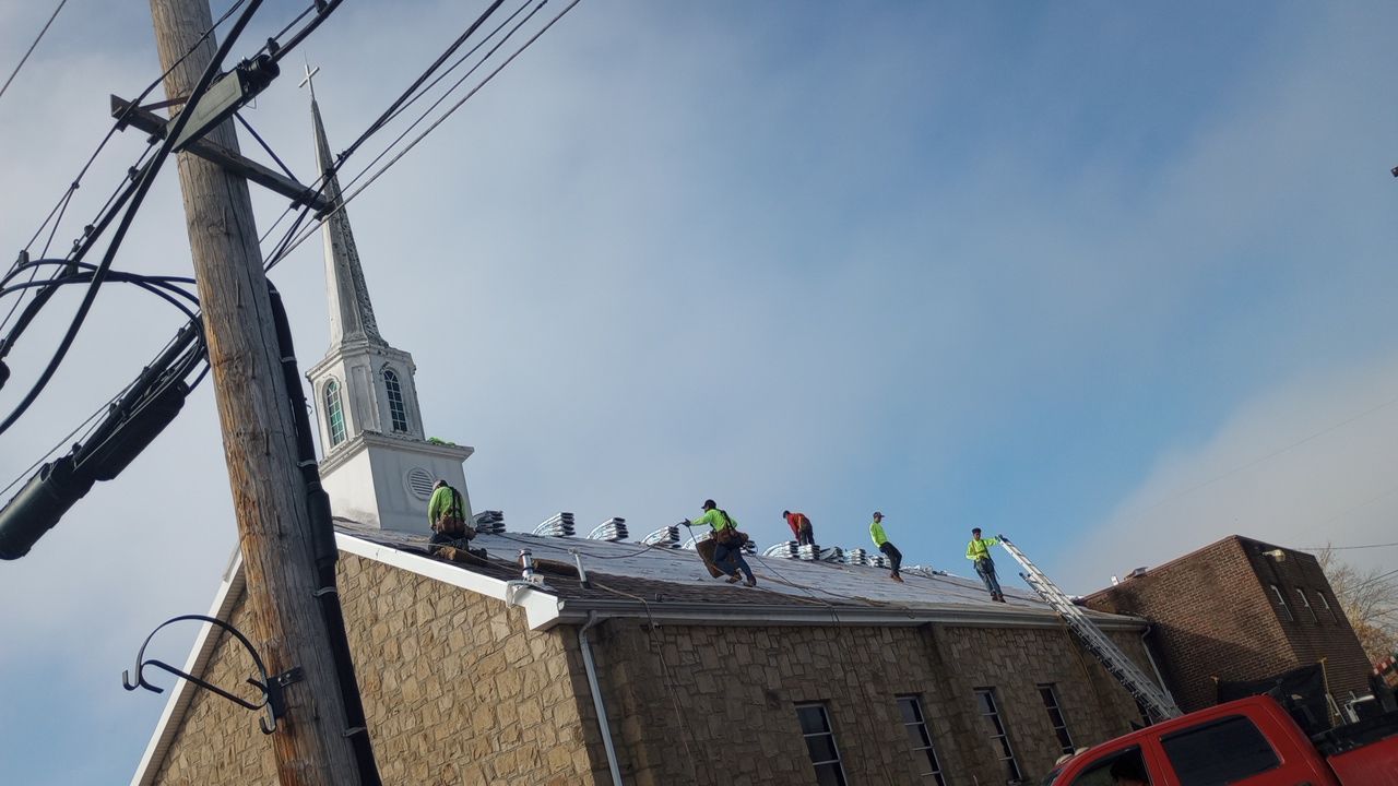 Commercial Roofing Installation using Performance Shingles by Mr. Roofer