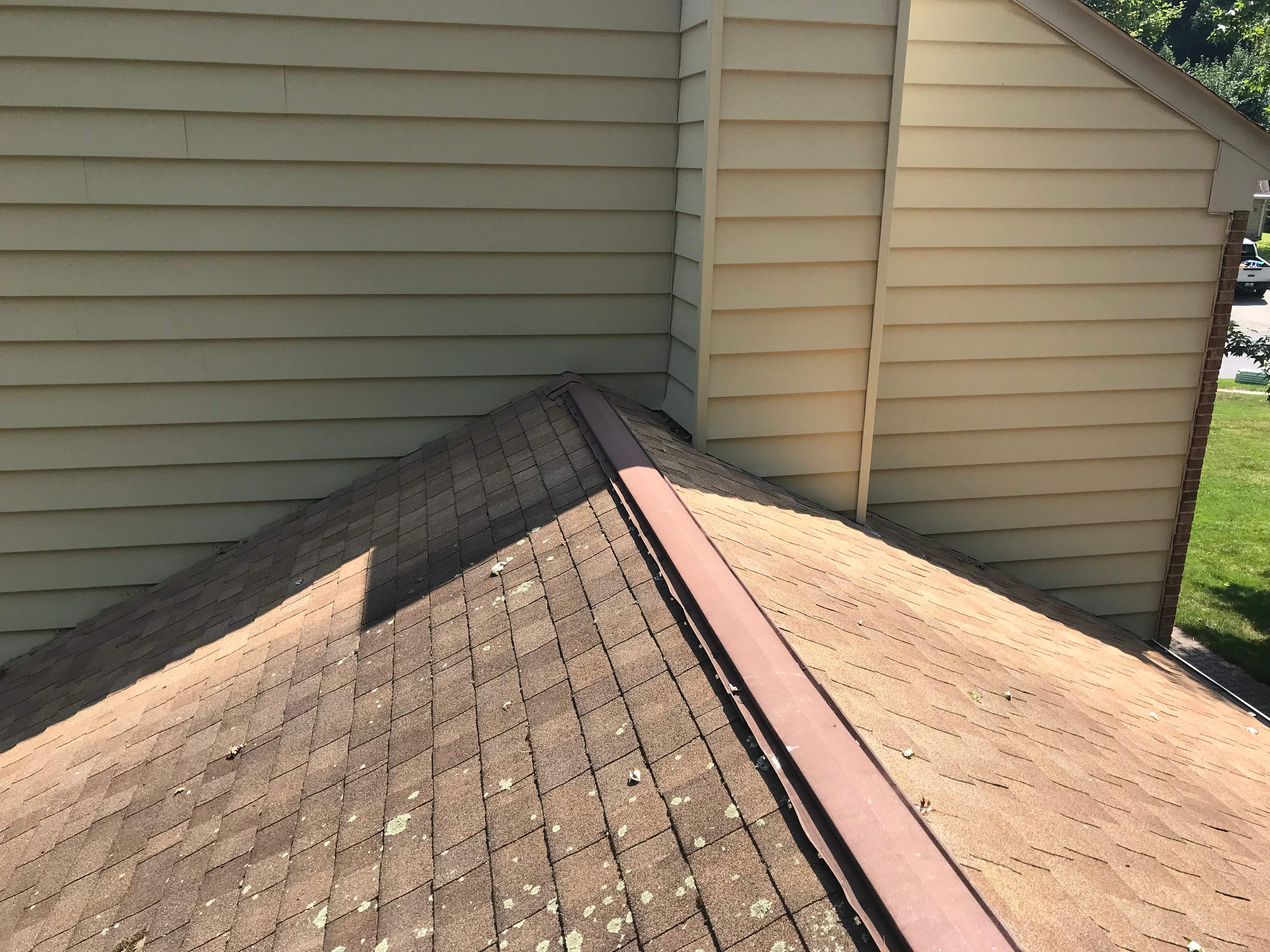 Residential Roofing Installation using Landmark Shingles Color Weatherwood by Alpha Design Services